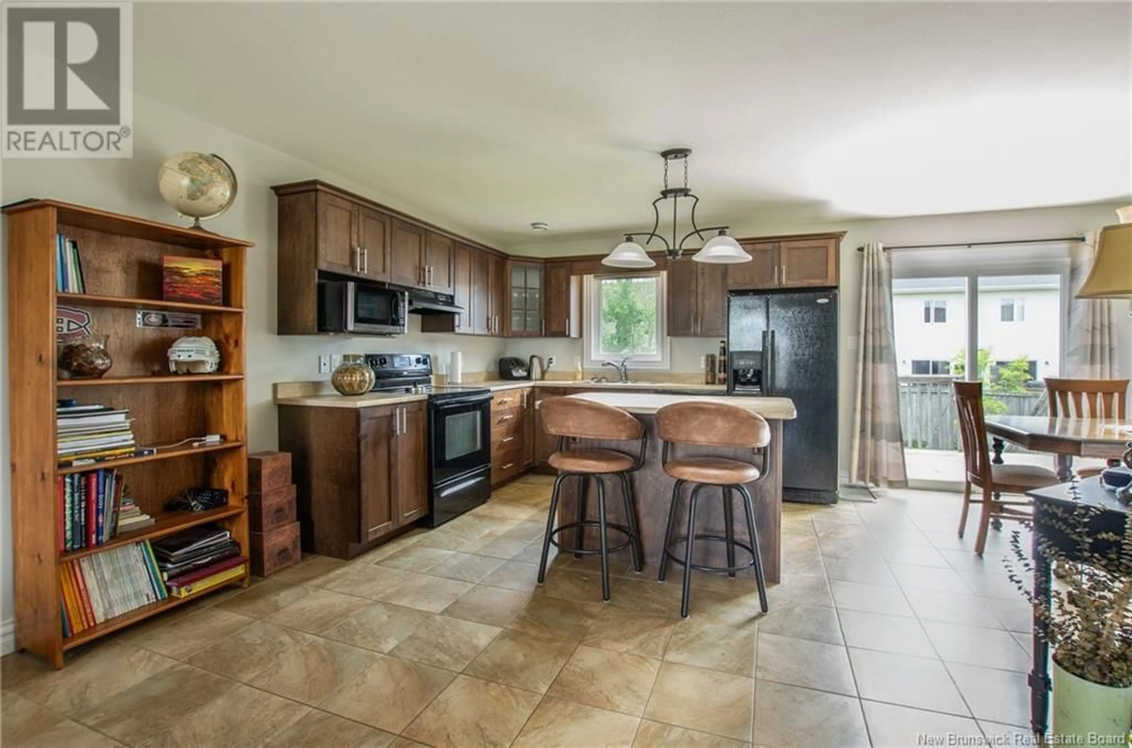 Open concept kitchen, ceramic/tile floor for 99 JEANNETTE STREET, Dieppe New Brunswick E1A0K3