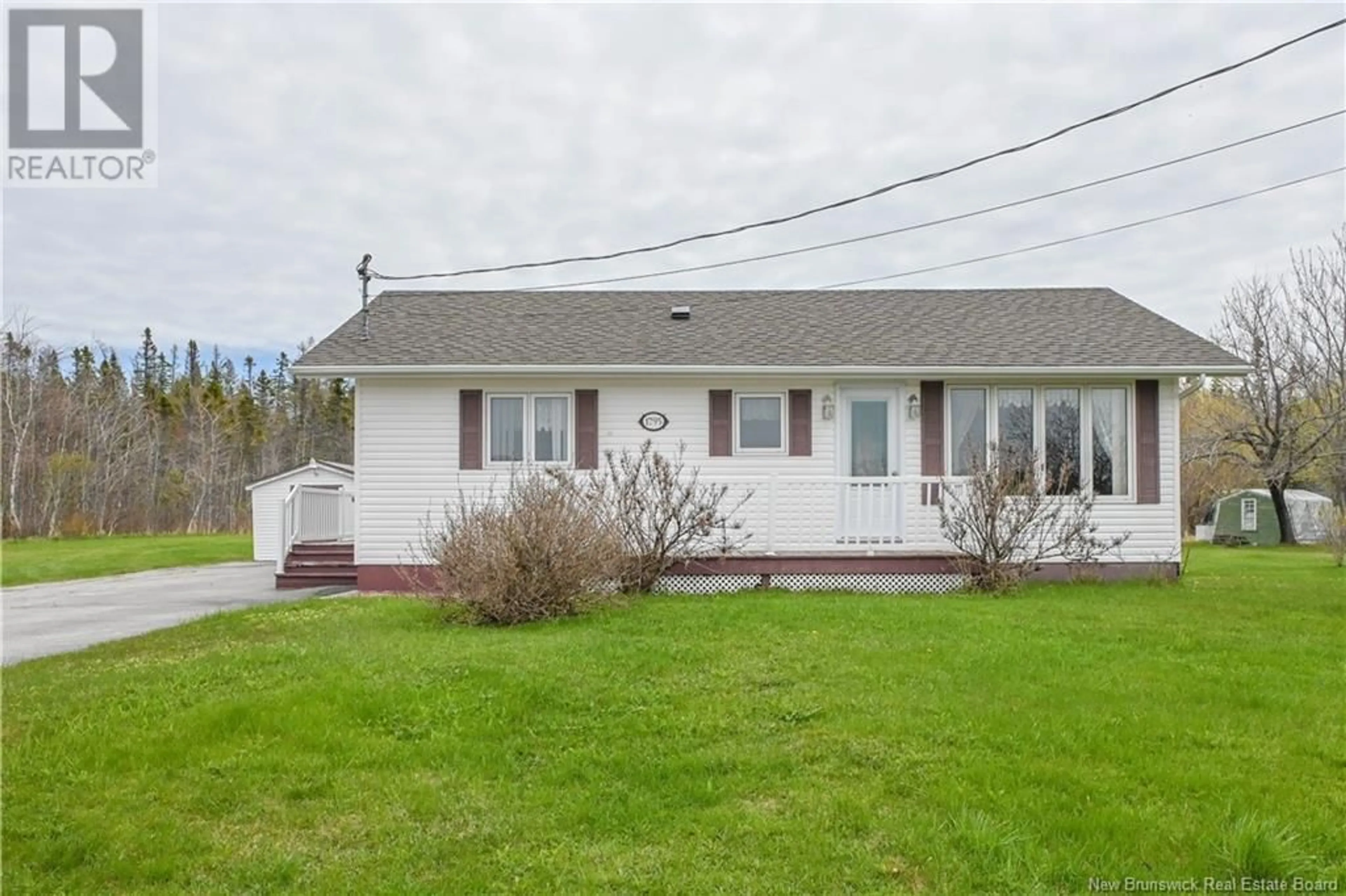 Home with vinyl exterior material, street for 1795 ROUTE 335, Saint-Simon New Brunswick E8P2A7