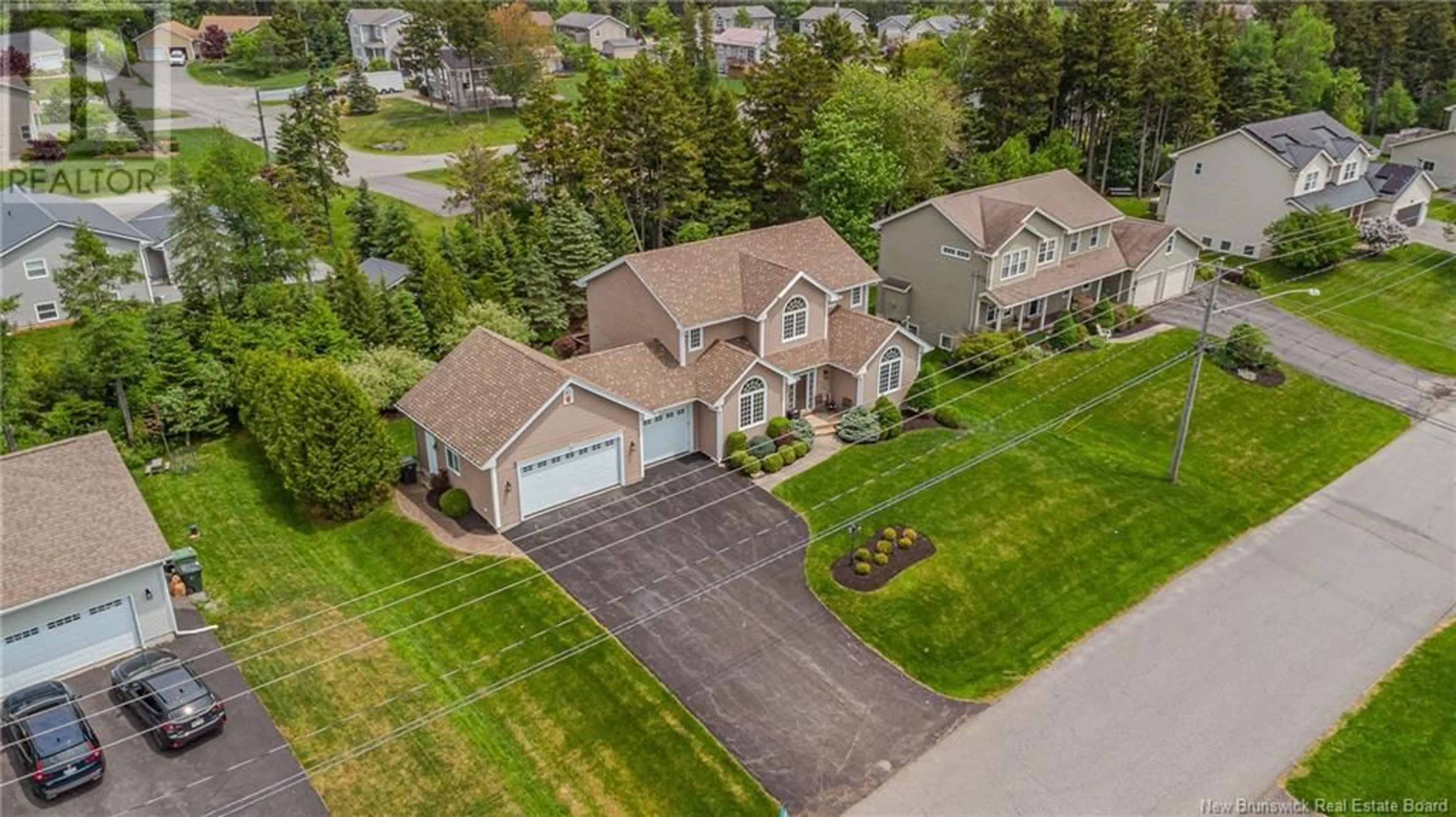 A pic from outside/outdoor area/front of a property/back of a property/a pic from drone, street for 27 GRASMERE AVENUE, Quispamsis New Brunswick E2E0B5