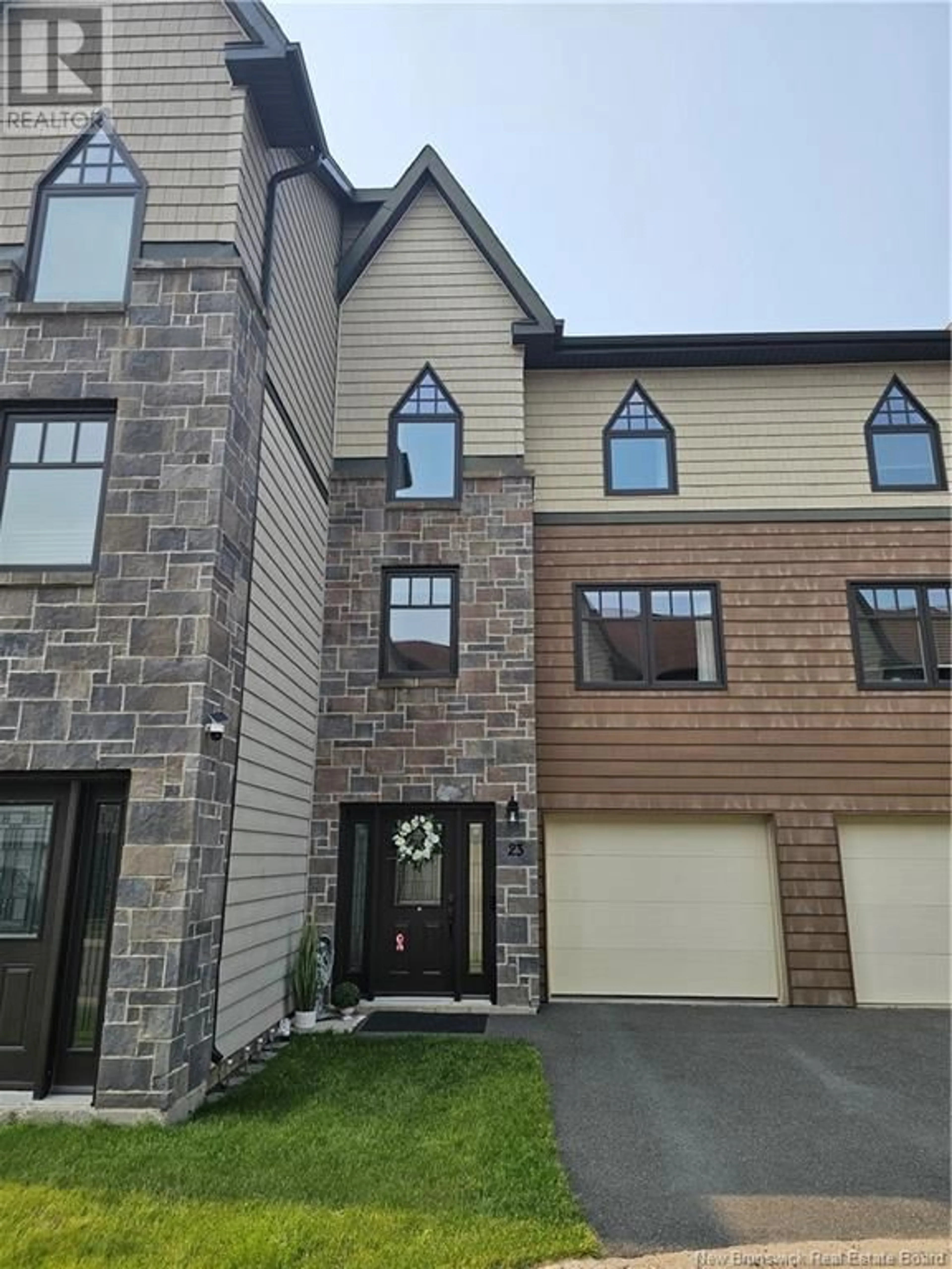 Home with brick exterior material, street for 23 BROWNSTONE LANE, Fredericton New Brunswick E3A7M4