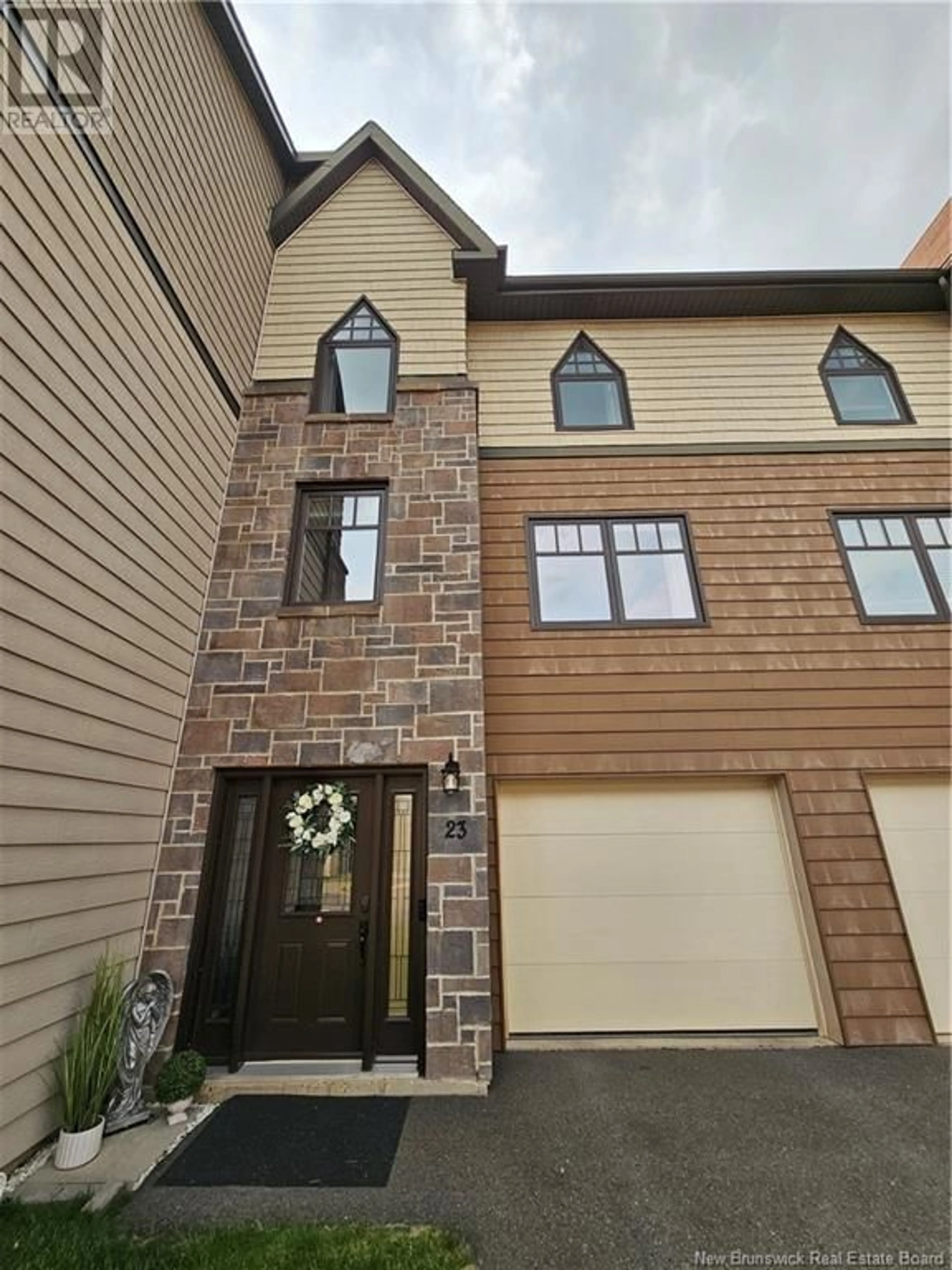 Home with brick exterior material, street for 23 BROWNSTONE LANE, Fredericton New Brunswick E3A7M4