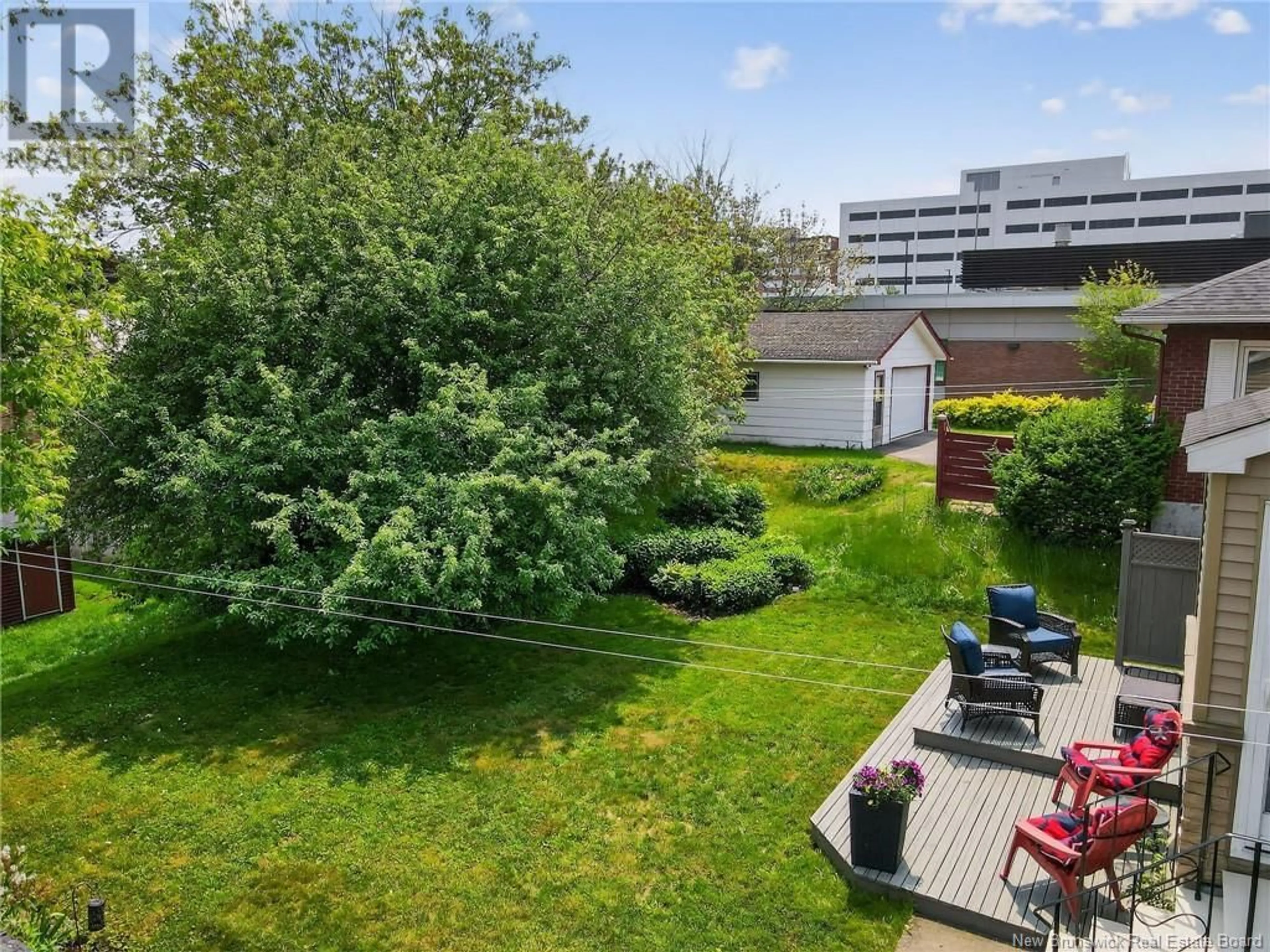 A pic from outside/outdoor area/front of a property/back of a property/a pic from drone, city buildings view from balcony for 183 MACBEATH AVENUE, Moncton New Brunswick E1C6Z9