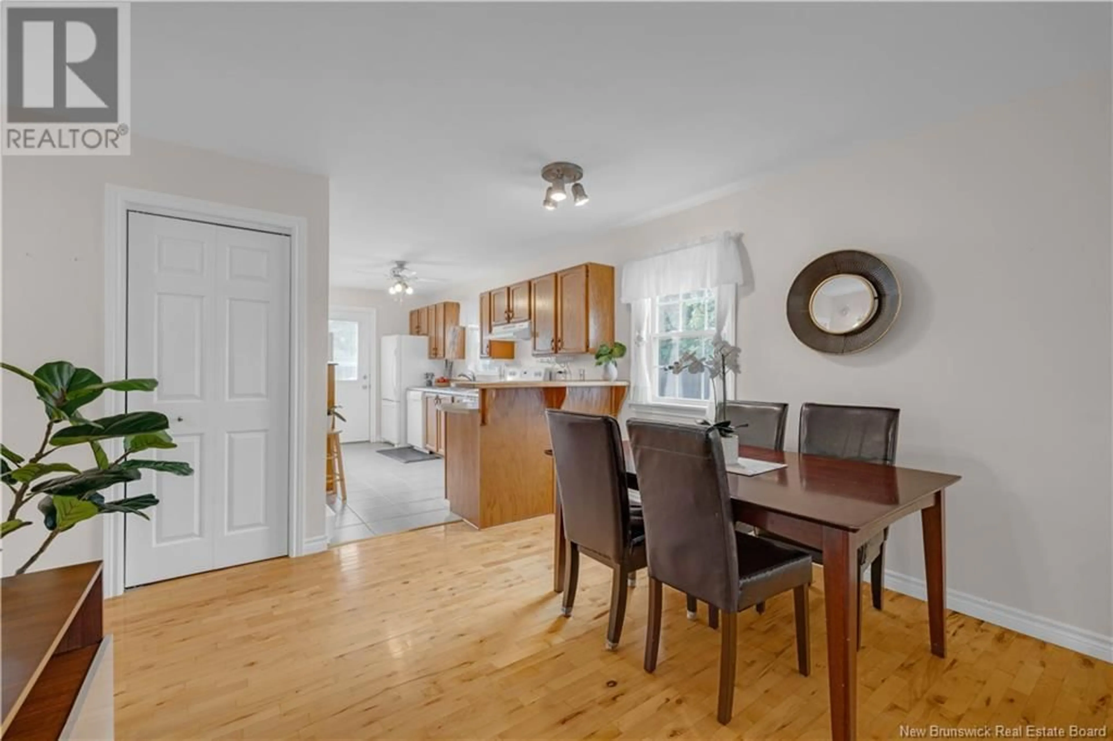 Open concept kitchen, wood/laminate floor for 14 HERITAGE GARDENS, Saint John New Brunswick E2M5R7