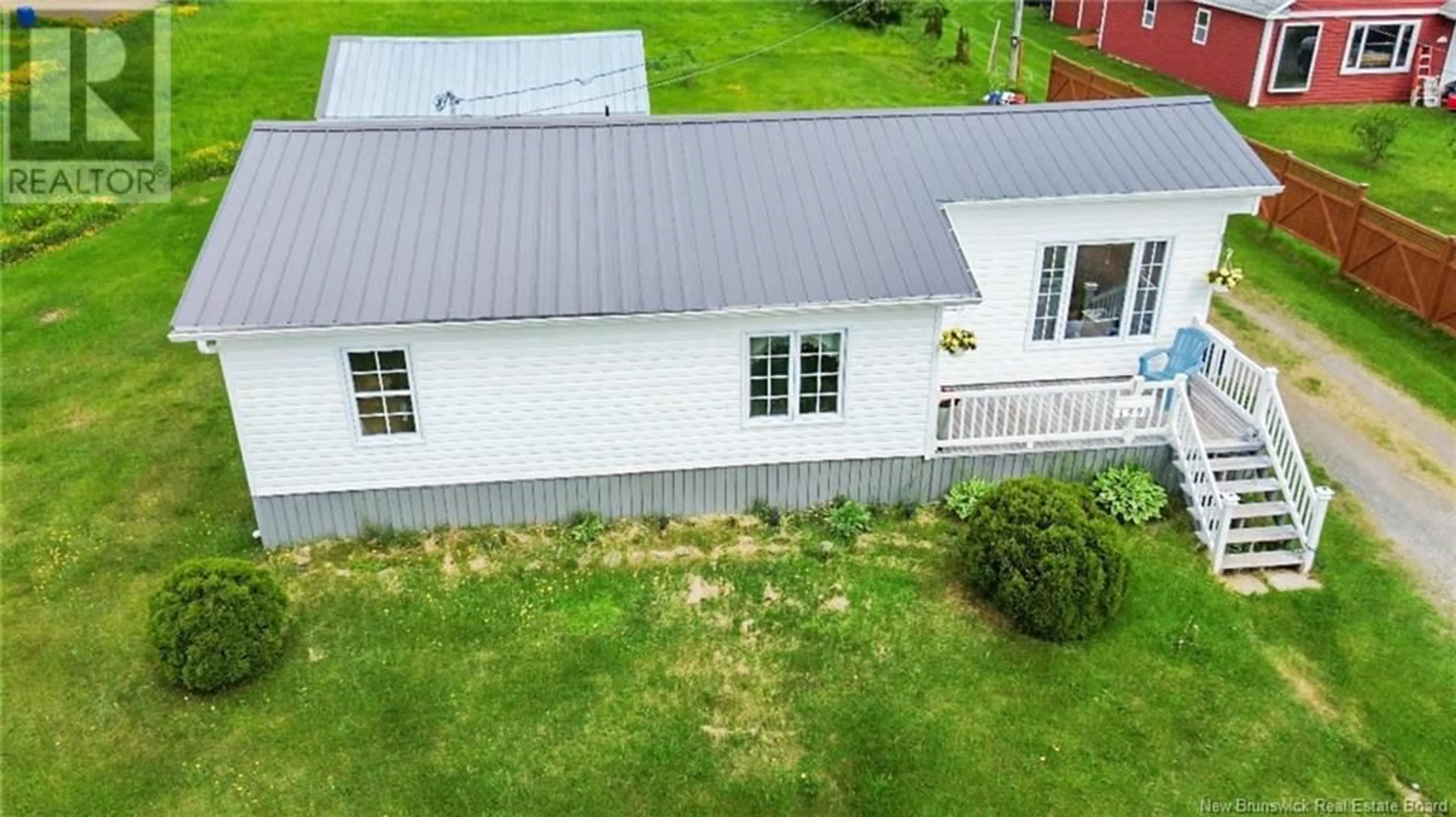 A pic from outside/outdoor area/front of a property/back of a property/a pic from drone, building for 1590 ROBERTVILLE, Robertville New Brunswick E8K2T1