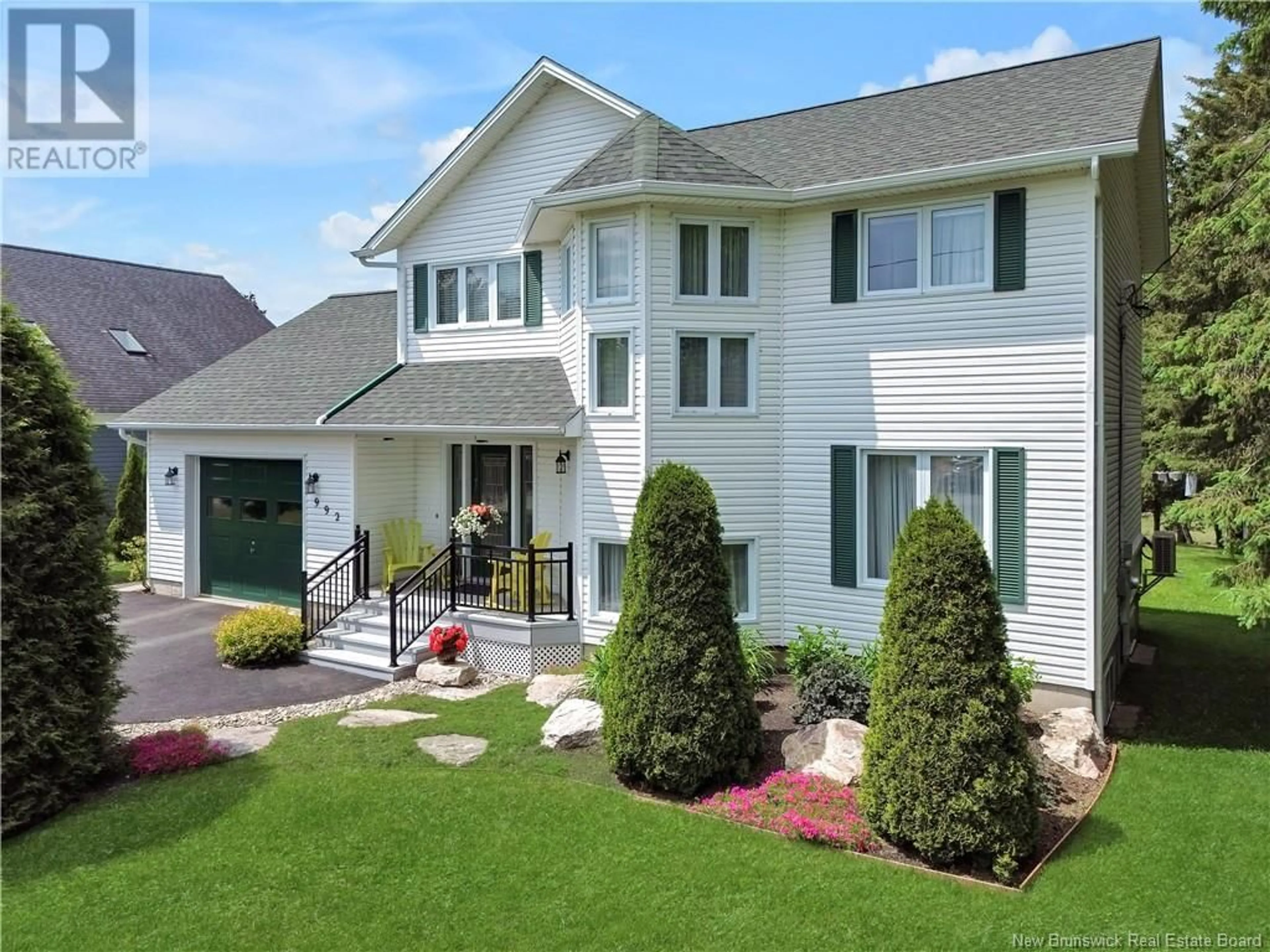 Home with vinyl exterior material, mountain view for 992 RUE DE LA MER, Beresford New Brunswick E8K1H6