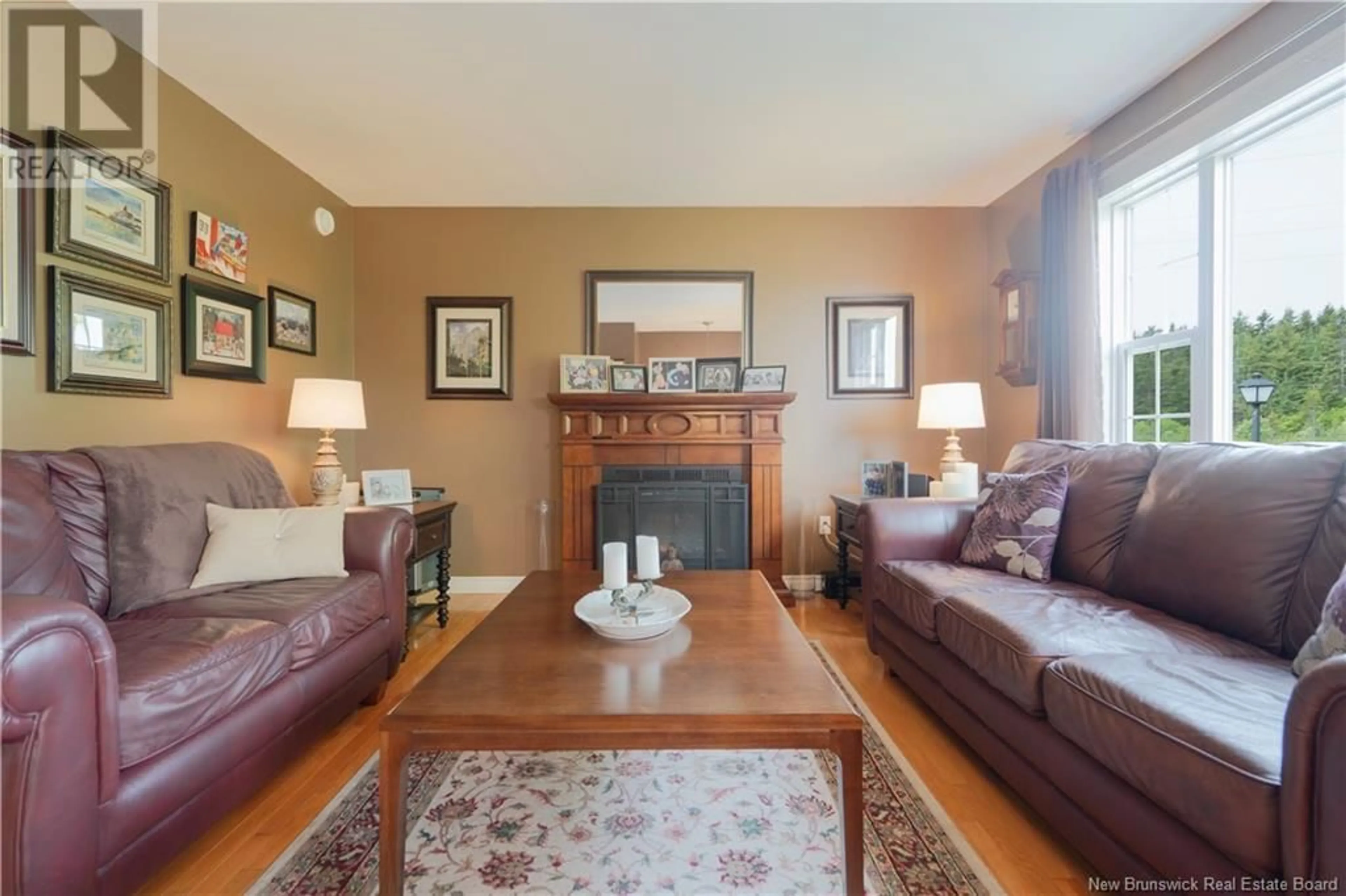 Living room with furniture, wood/laminate floor for 39 STRATHORNE AVENUE, Saint John New Brunswick E2J4K5