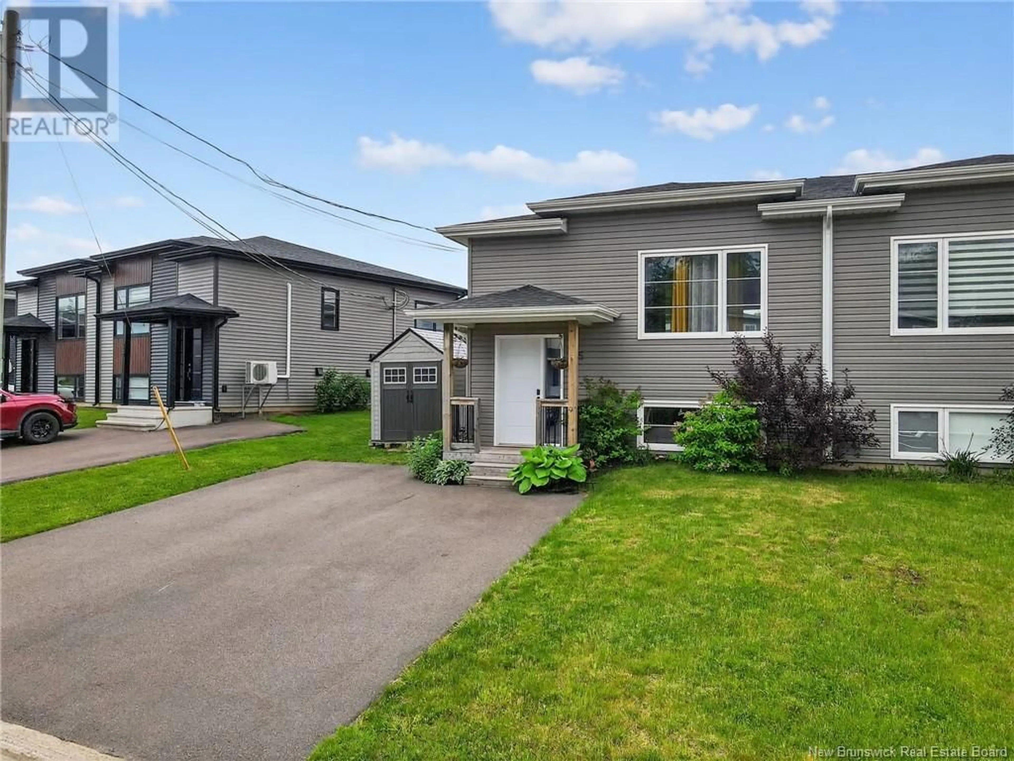 Home with vinyl exterior material, street for 235 BELLE FORET STREET, Dieppe New Brunswick E1A9E6