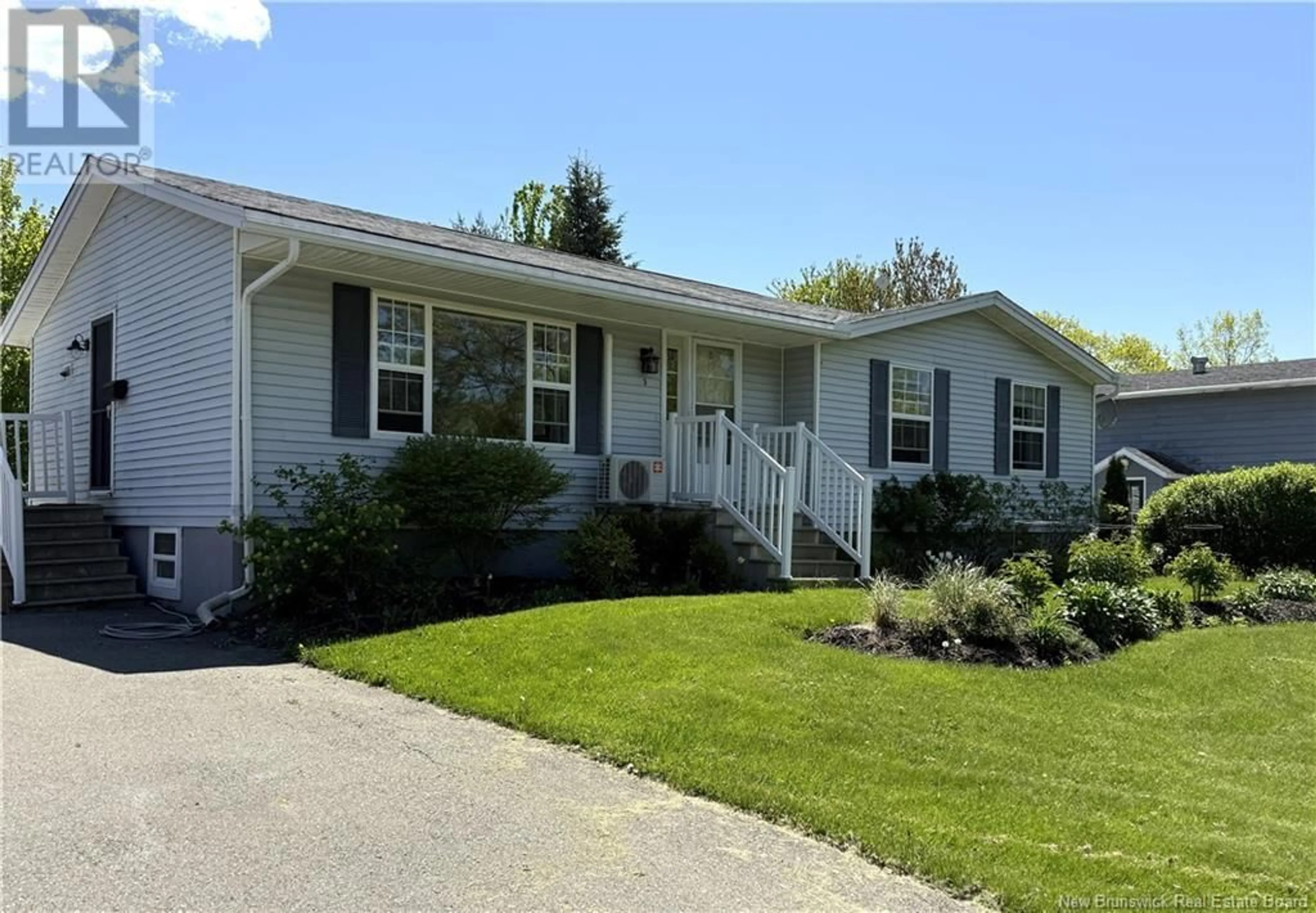 Home with vinyl exterior material, street for 3 ABBOTT STREET, St. Stephen New Brunswick E3L3A8