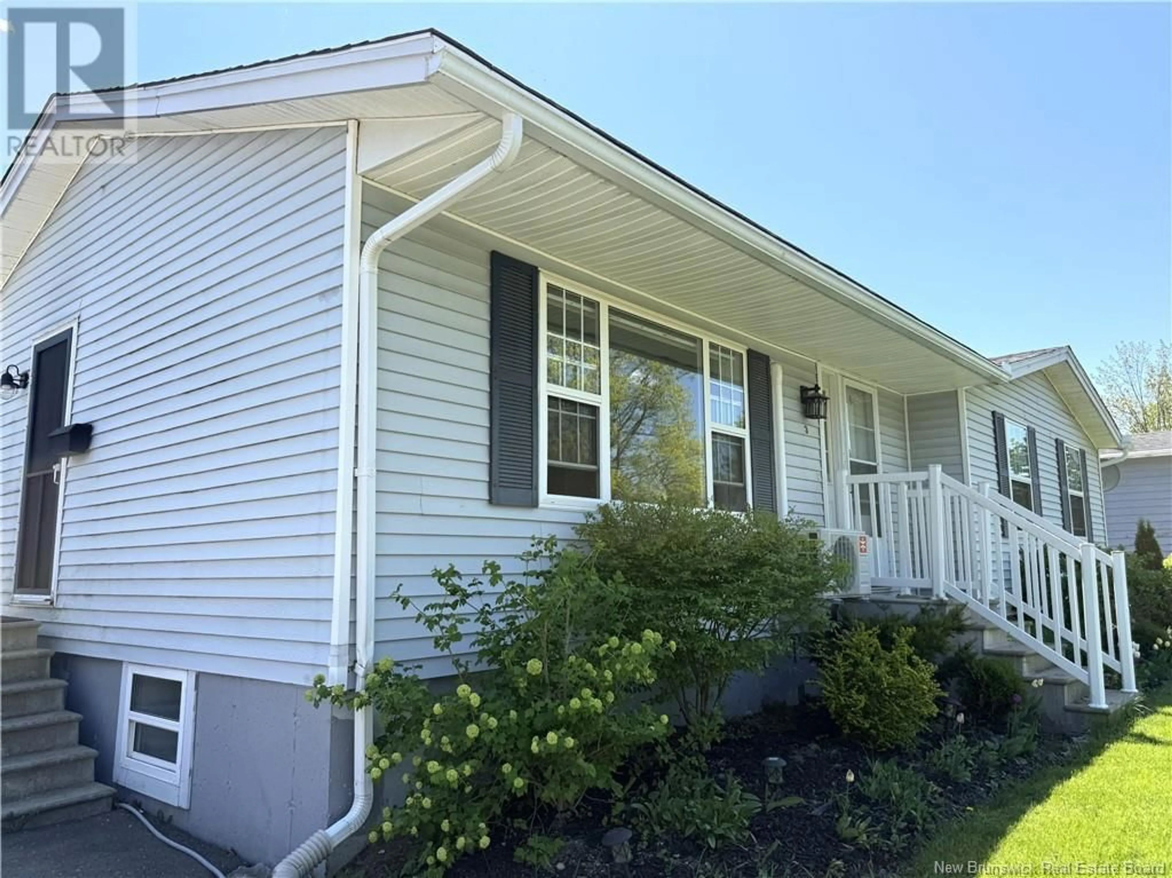 Home with vinyl exterior material, street for 3 ABBOTT STREET, St. Stephen New Brunswick E3L3A8