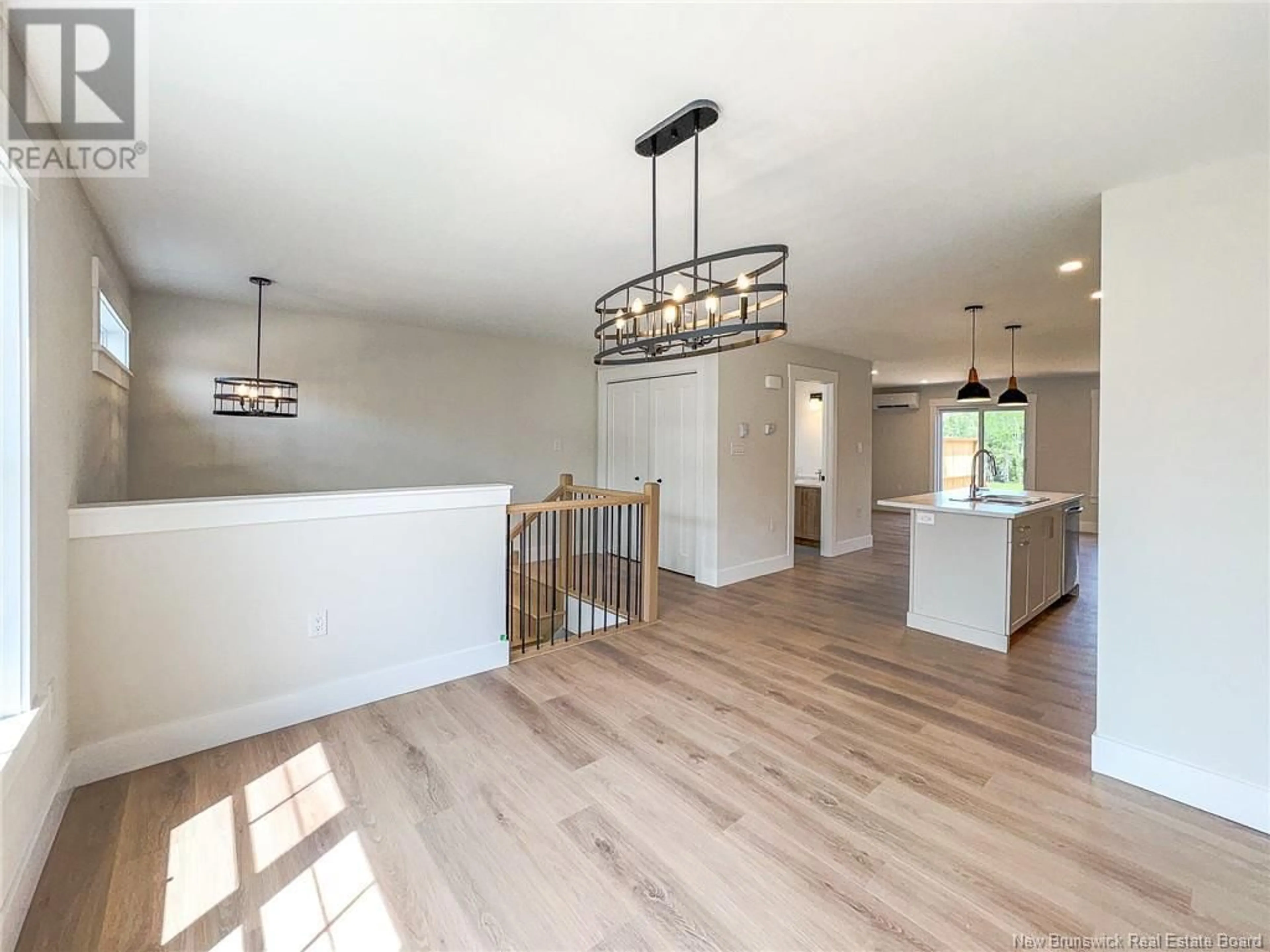 Open concept kitchen, wood/laminate floor for 136 ELSLIGER STREET, Dieppe New Brunswick E1A7X9