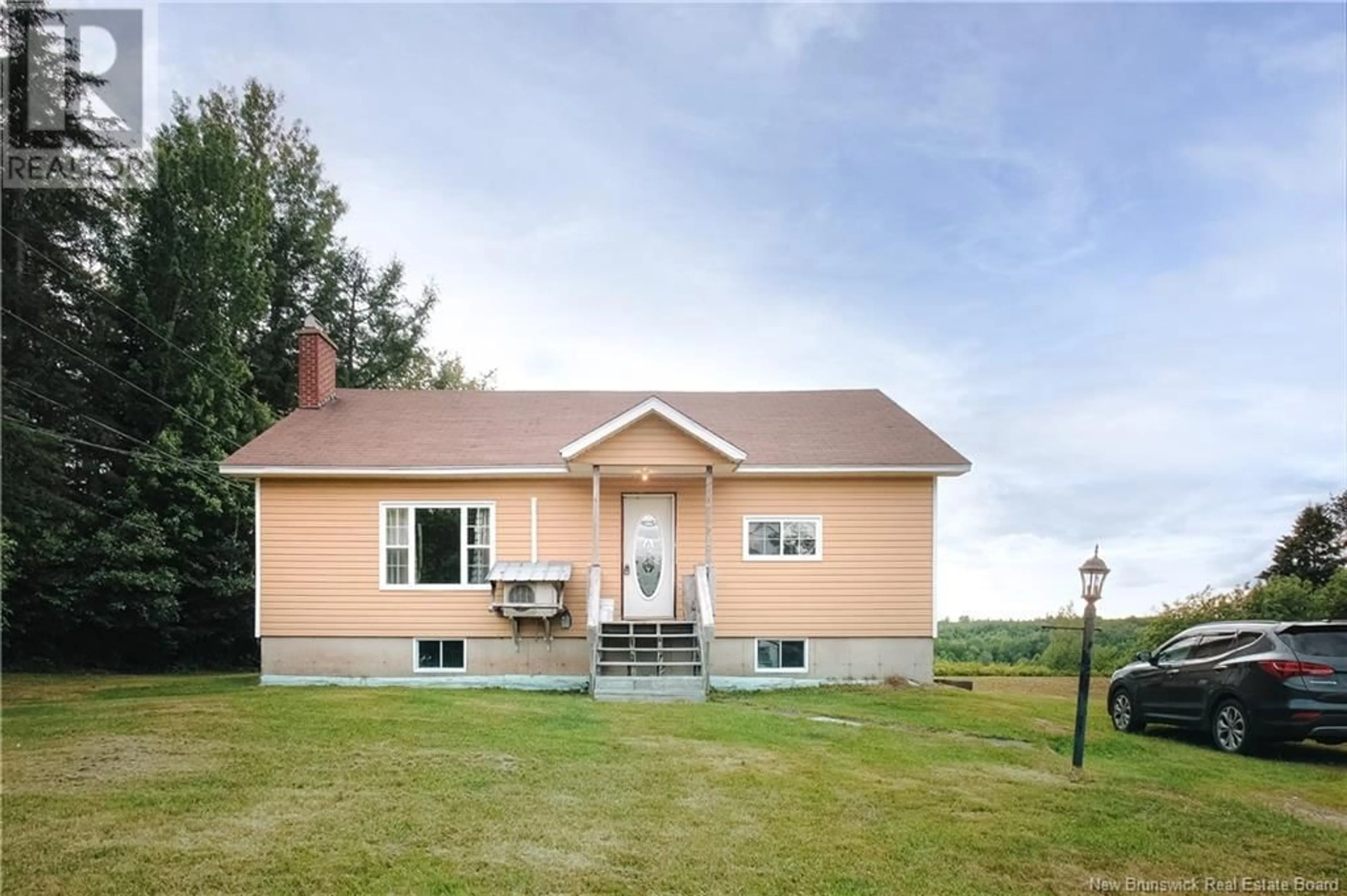 Home with vinyl exterior material, street for 825 SANATORIUM ROAD, The Glades New Brunswick E4J1W6