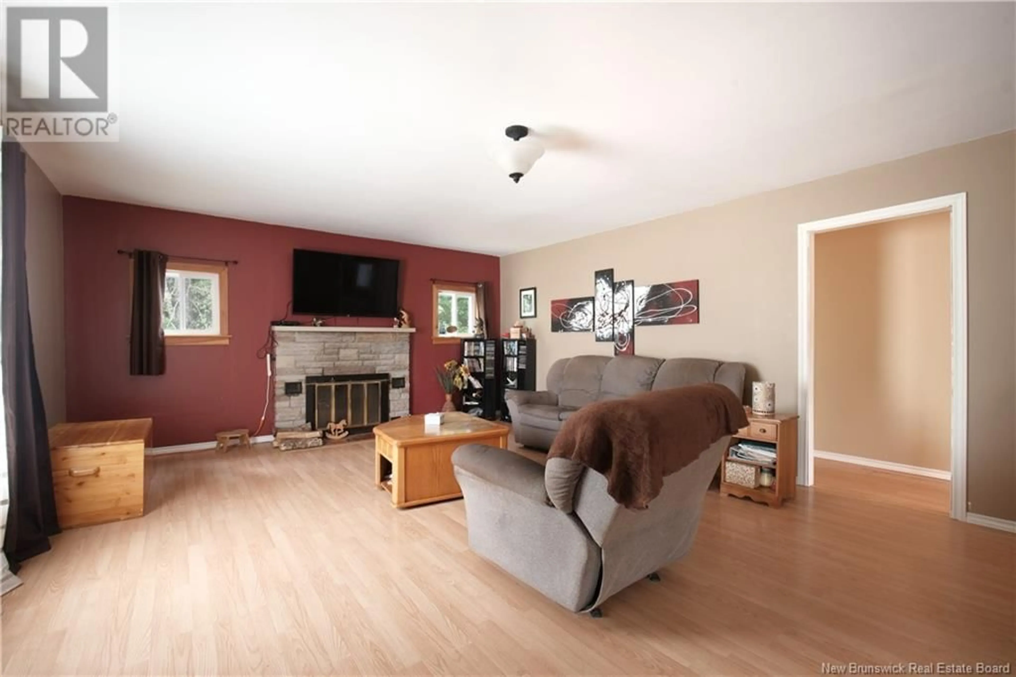Living room with furniture, wood/laminate floor for 825 SANATORIUM ROAD, The Glades New Brunswick E4J1W6