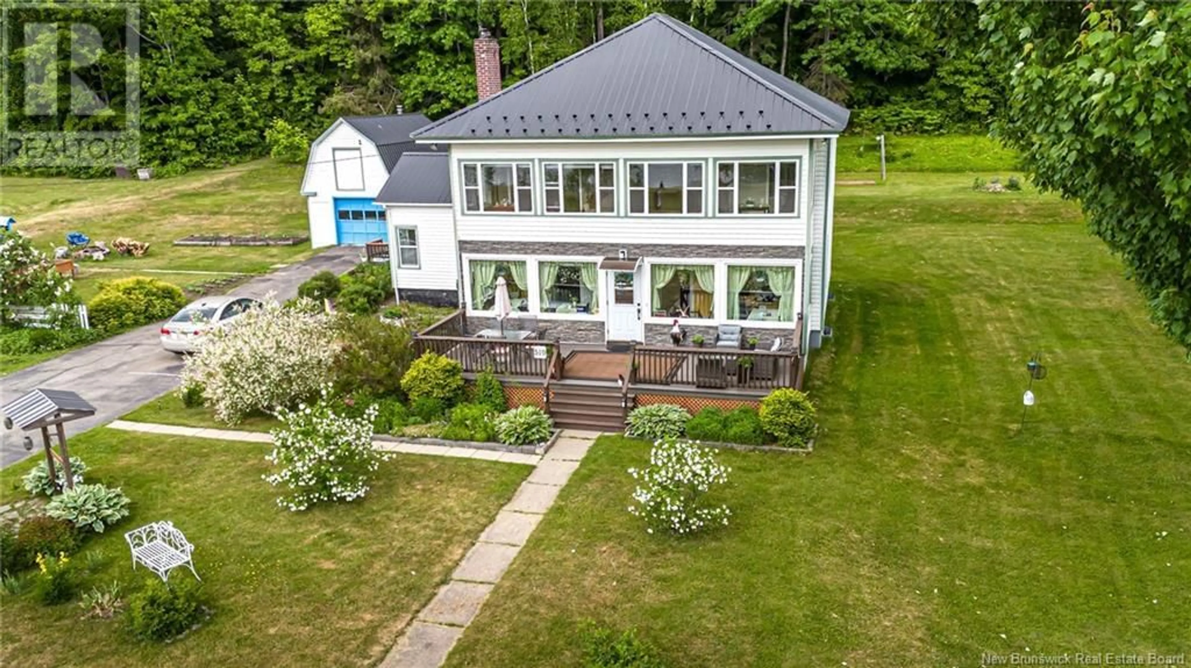 A pic from outside/outdoor area/front of a property/back of a property/a pic from drone, building for 519-531 OTIS DRIVE, Nackawic New Brunswick E6G1H6