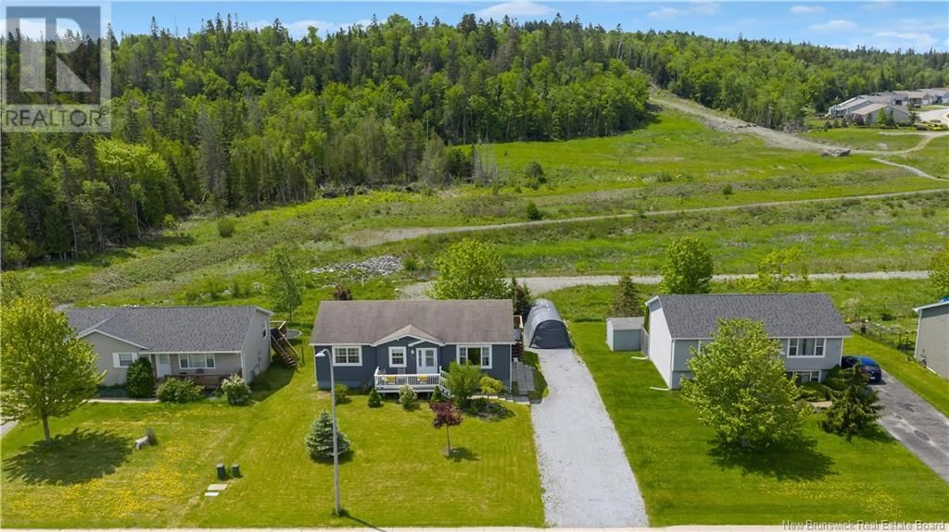 A pic from outside/outdoor area/front of a property/back of a property/a pic from drone, unknown for 237 BOARS HEAD ROAD, Saint John New Brunswick E2K5B9