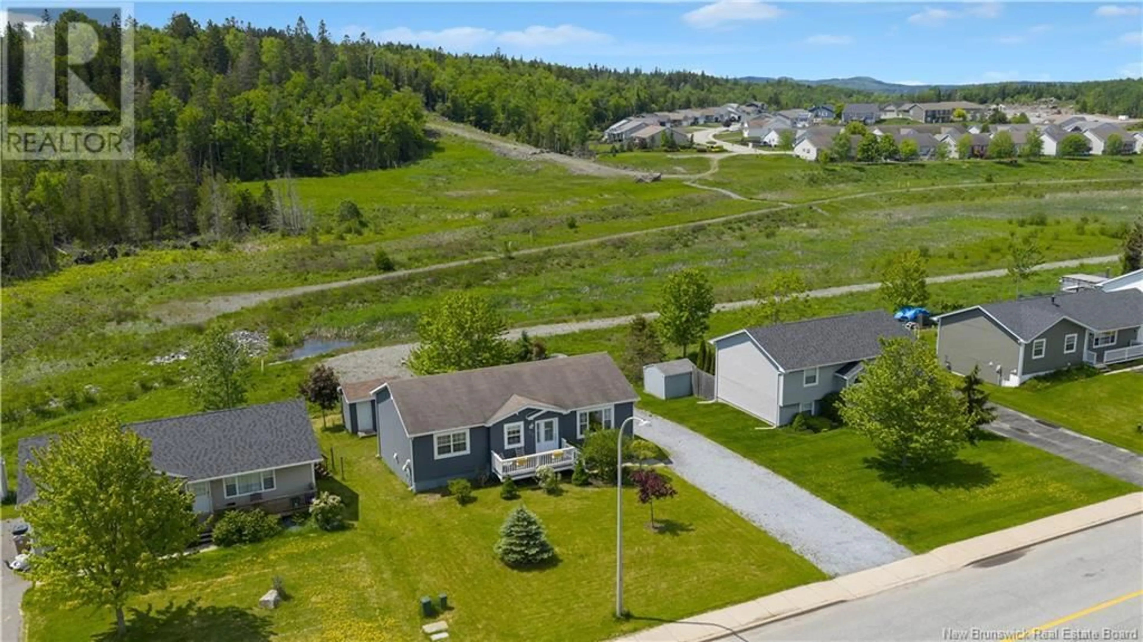 A pic from outside/outdoor area/front of a property/back of a property/a pic from drone, unknown for 237 BOARS HEAD ROAD, Saint John New Brunswick E2K5B9