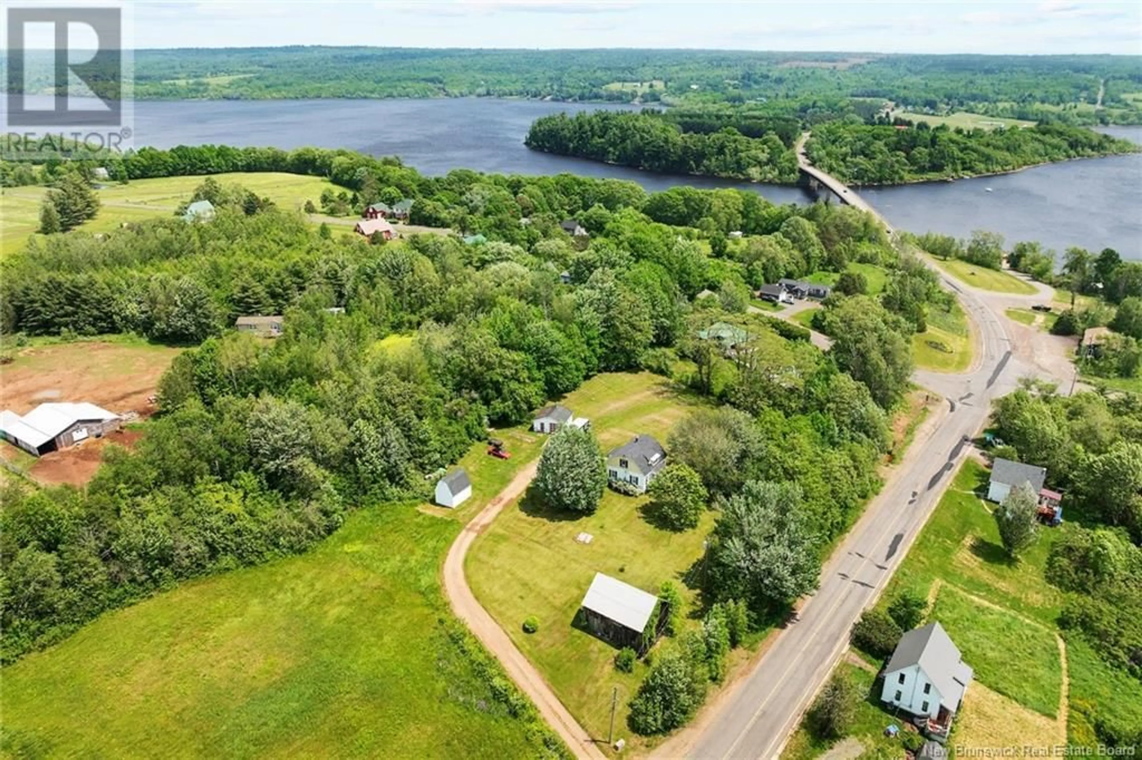 A pic from outside/outdoor area/front of a property/back of a property/a pic from drone, water/lake/river/ocean view for 1225 BRIDGE DRIVE, Cambridge-Narrows New Brunswick E4C1V5