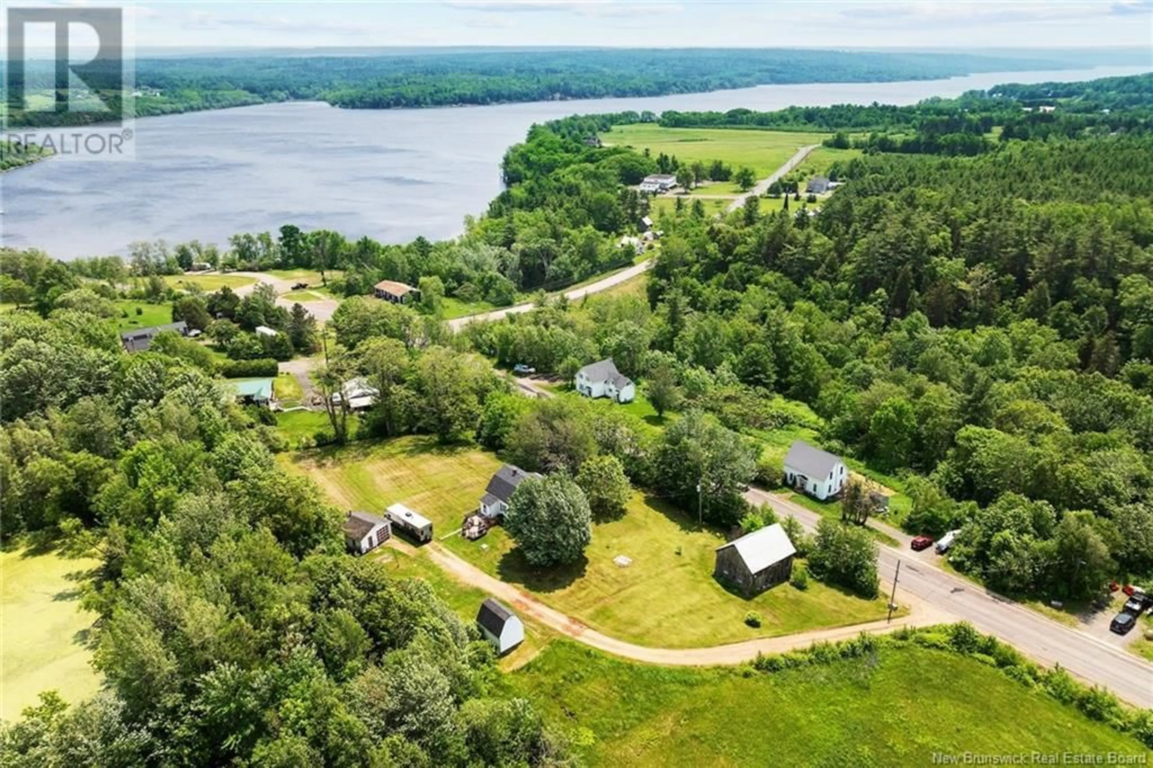 A pic from outside/outdoor area/front of a property/back of a property/a pic from drone, water/lake/river/ocean view for 1225 BRIDGE DRIVE, Cambridge-Narrows New Brunswick E4C1V5