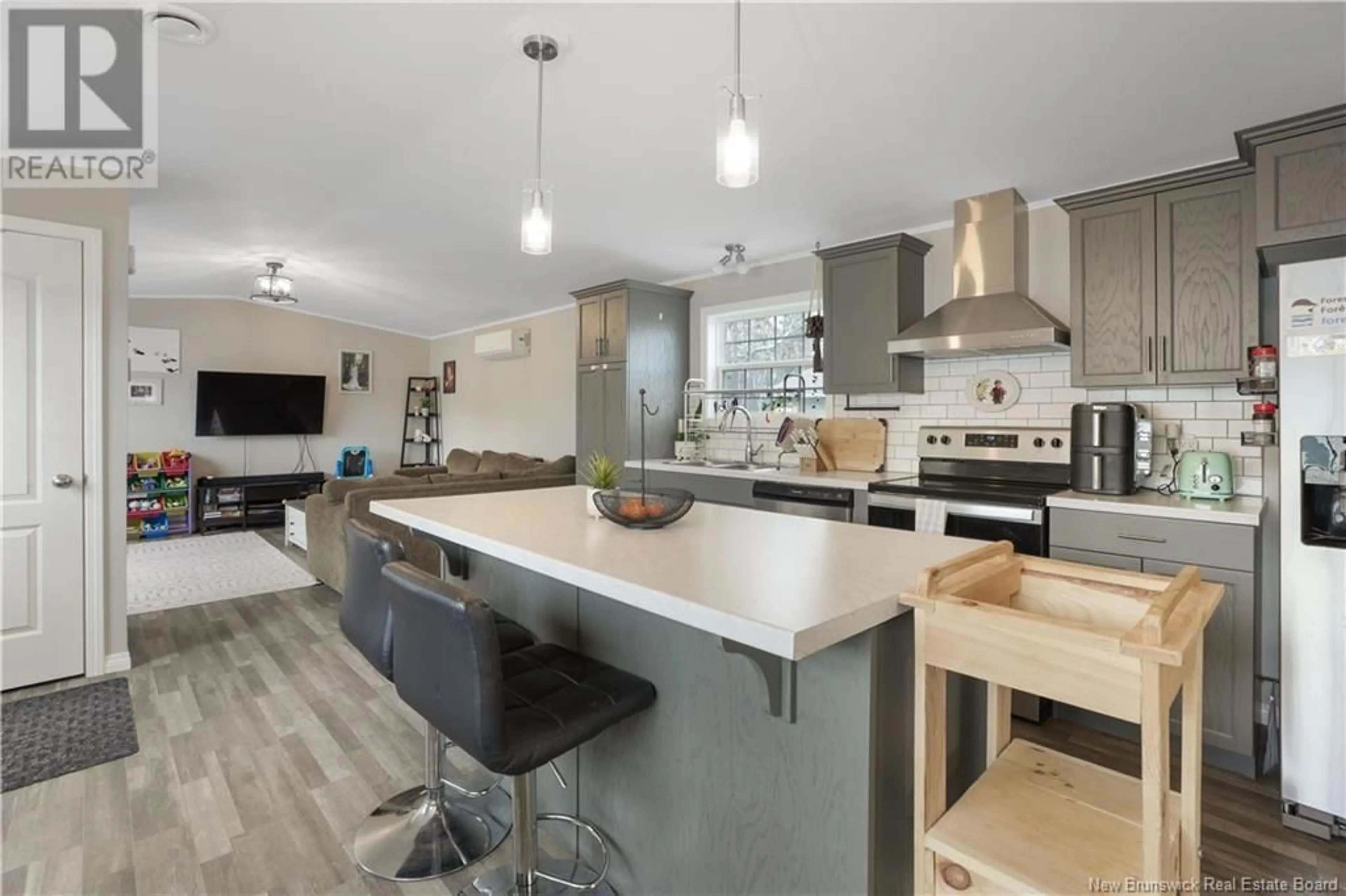 Open concept kitchen, wood/laminate floor for 66 EVERGREEN STREET, Fredericton New Brunswick E3B6N3