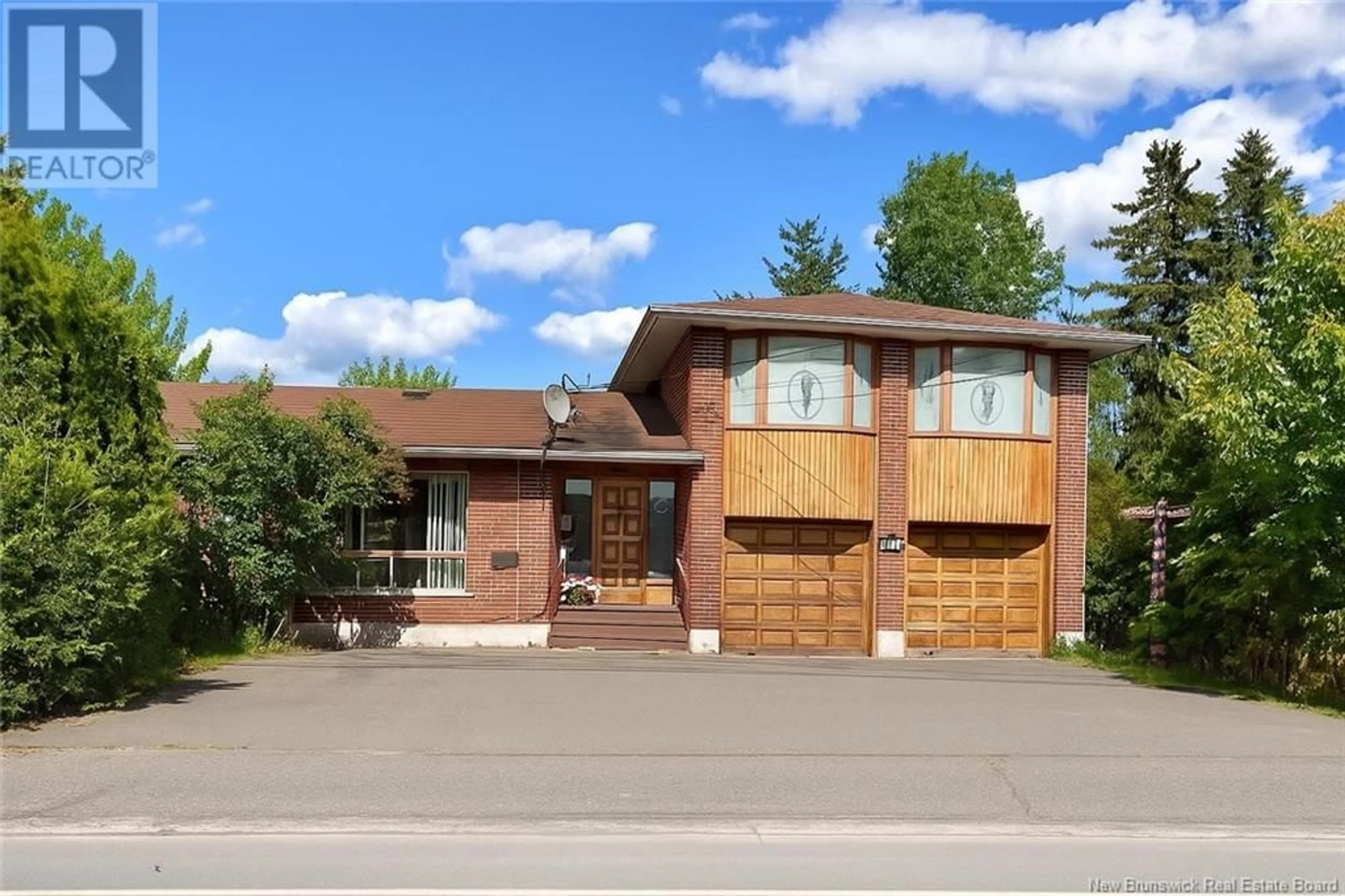 Home with brick exterior material, street for 869 VICTORIA STREET, Edmundston New Brunswick E3V3T4
