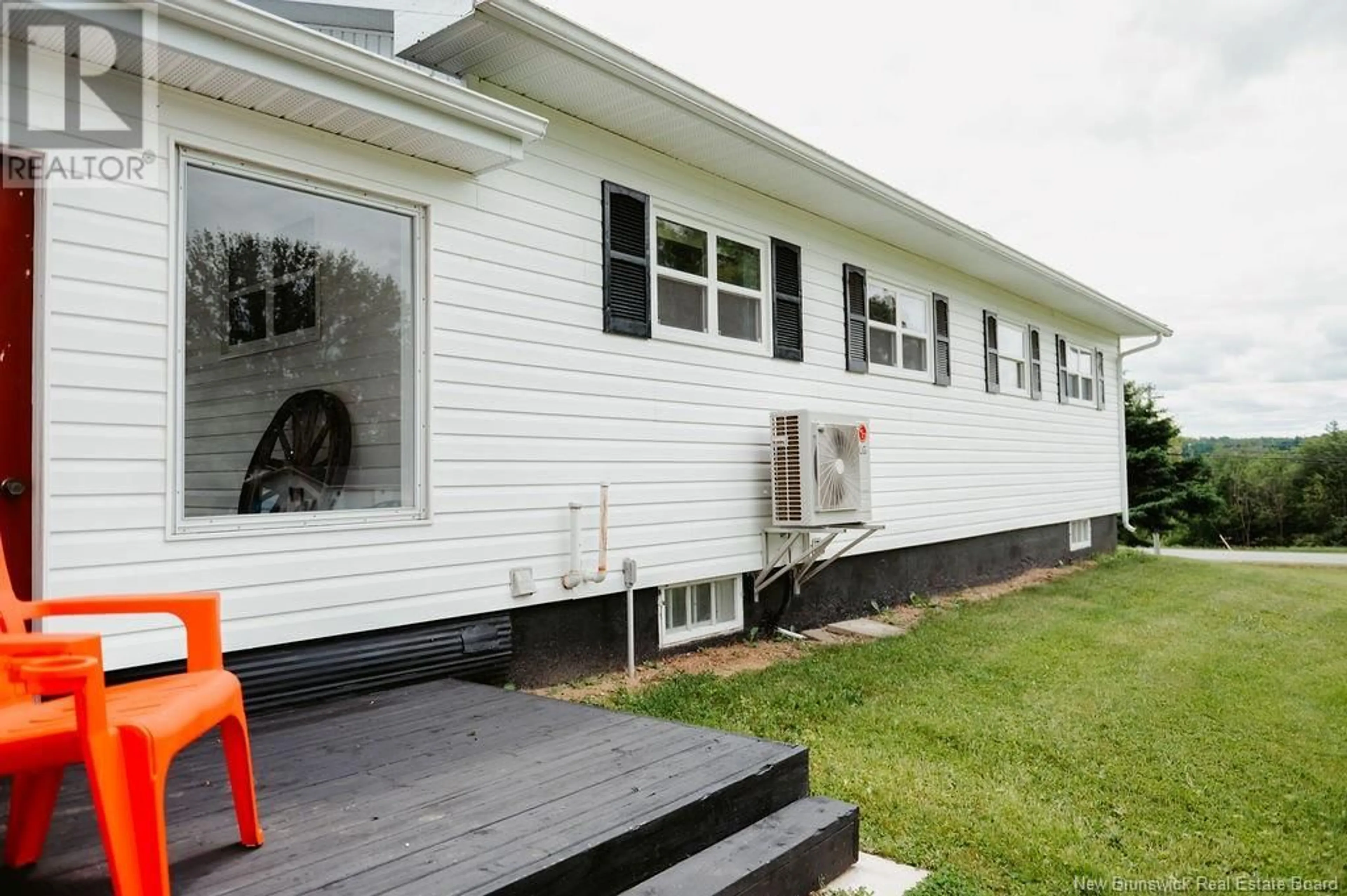 Home with vinyl exterior material, street for 3 MCELROY ROAD, Beechwood New Brunswick E7J1Y8