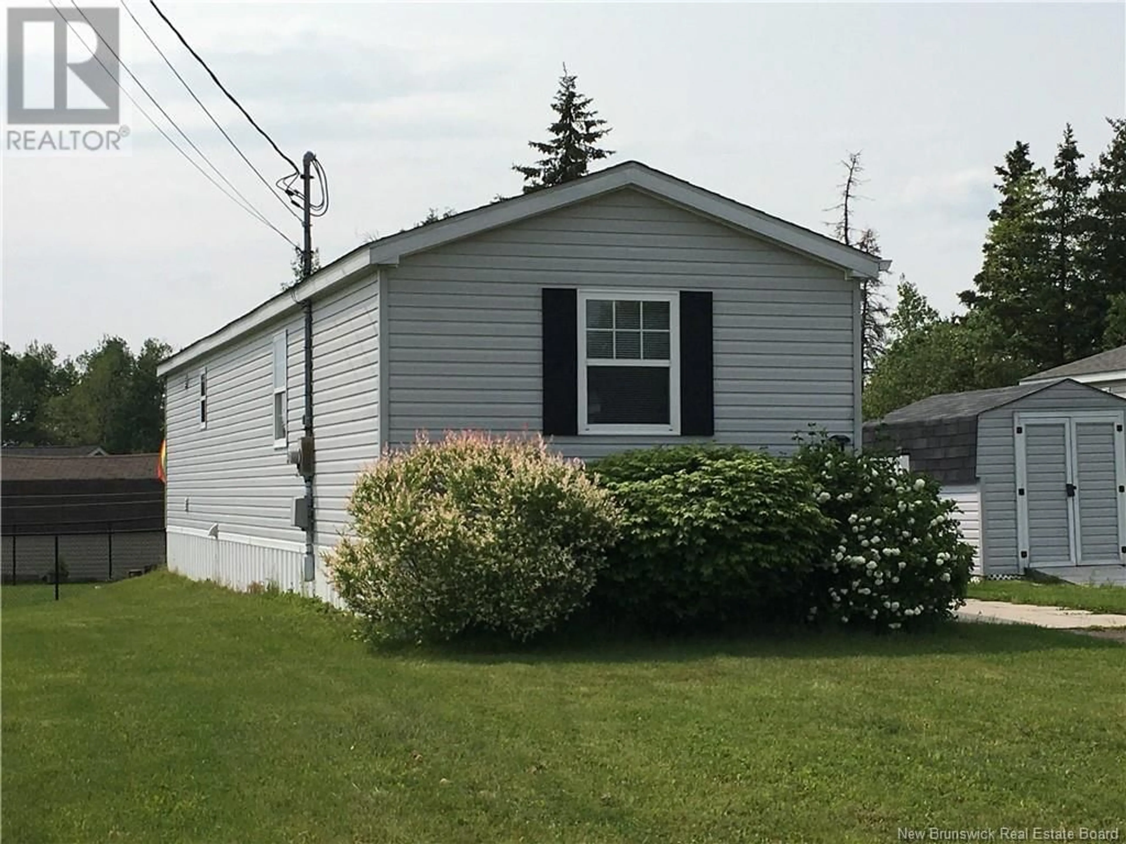 Home with vinyl exterior material, street for 61 ST-JEAN DRIVE, Dieppe New Brunswick E1A7N1