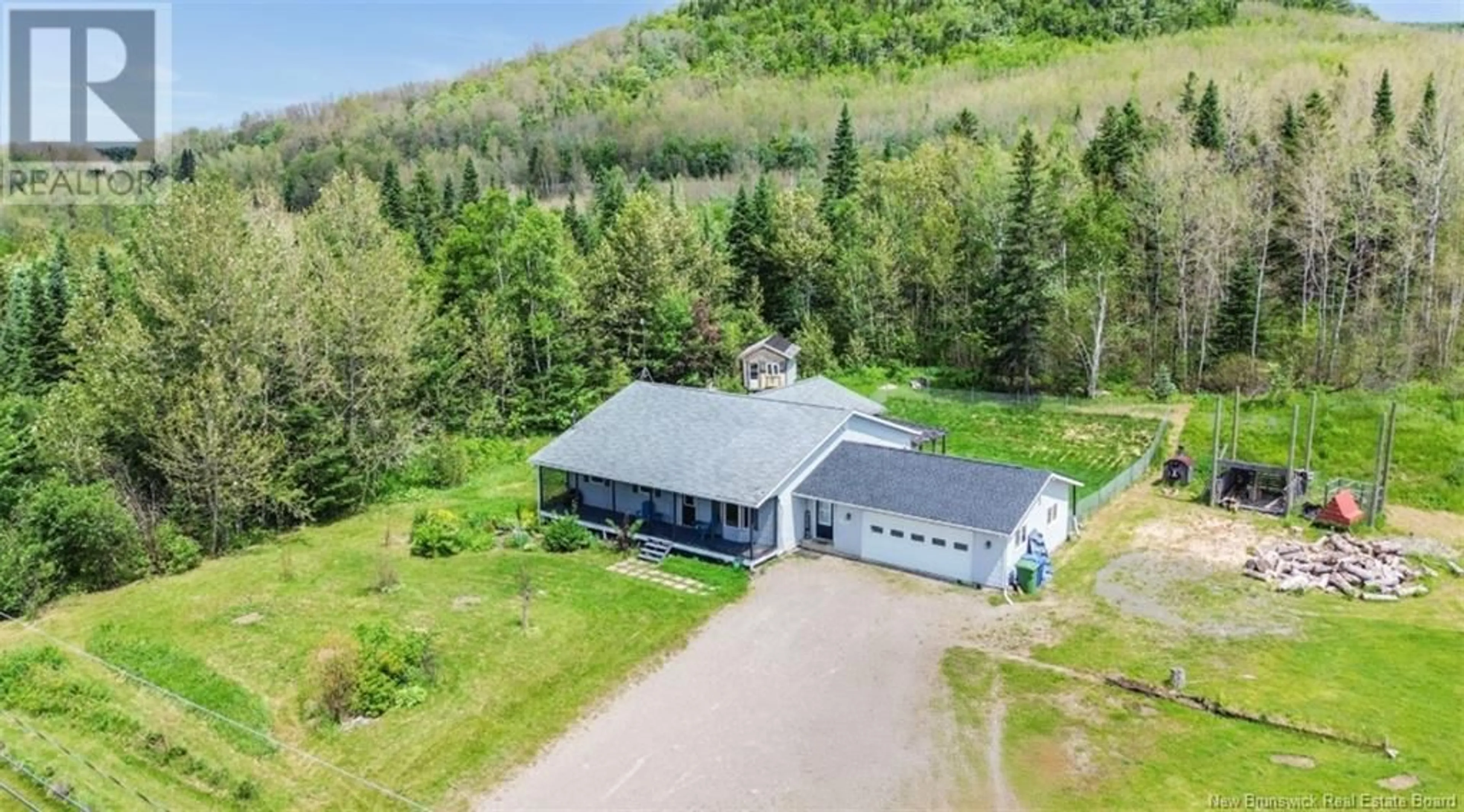A pic from outside/outdoor area/front of a property/back of a property/a pic from drone, unknown for 3398 ROUTE 108, New Denmark New Brunswick E7G2S7