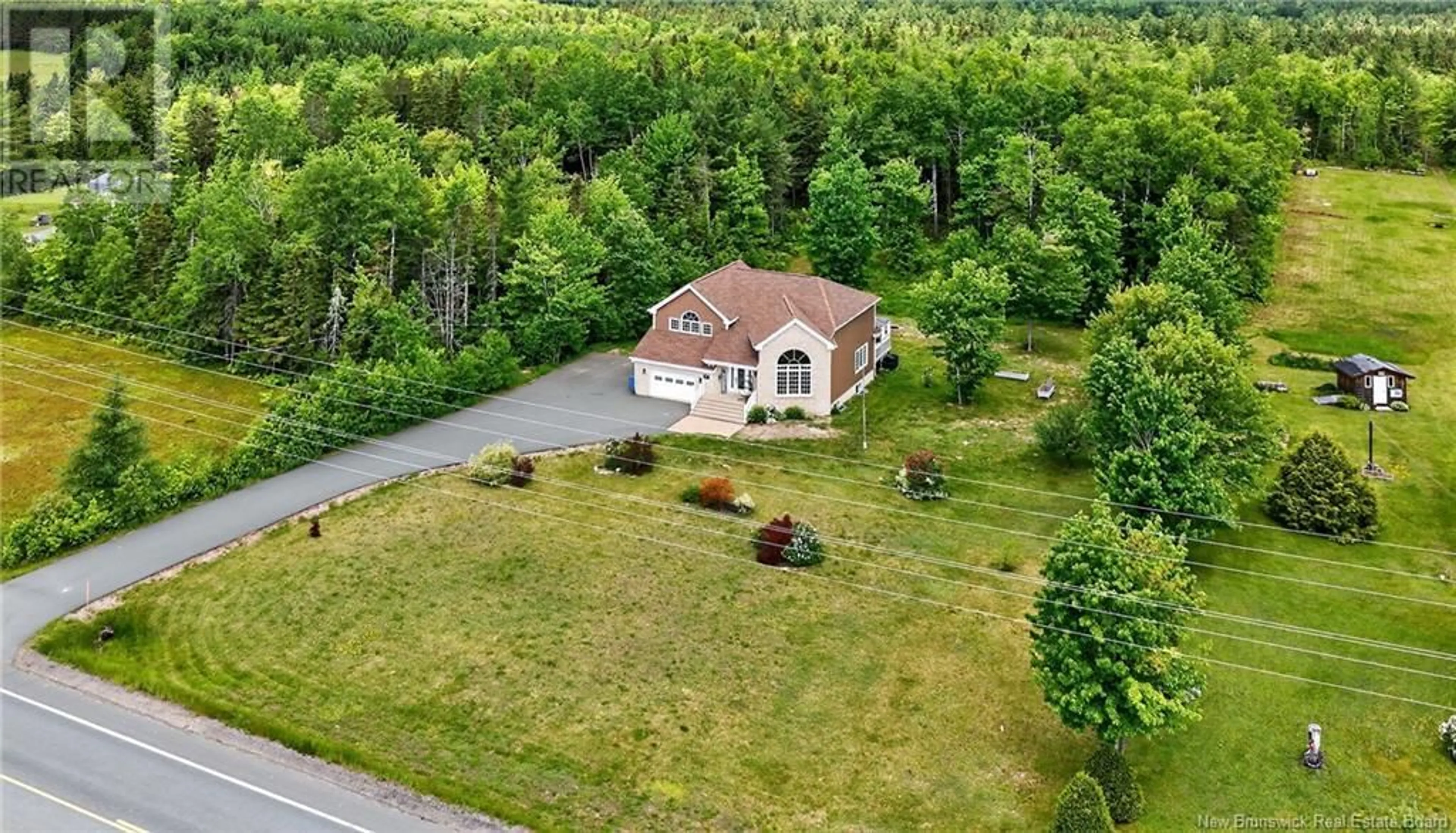 A pic from outside/outdoor area/front of a property/back of a property/a pic from drone, unknown for 2217 RTE 160, Saint-Sauveur New Brunswick E8L1P5