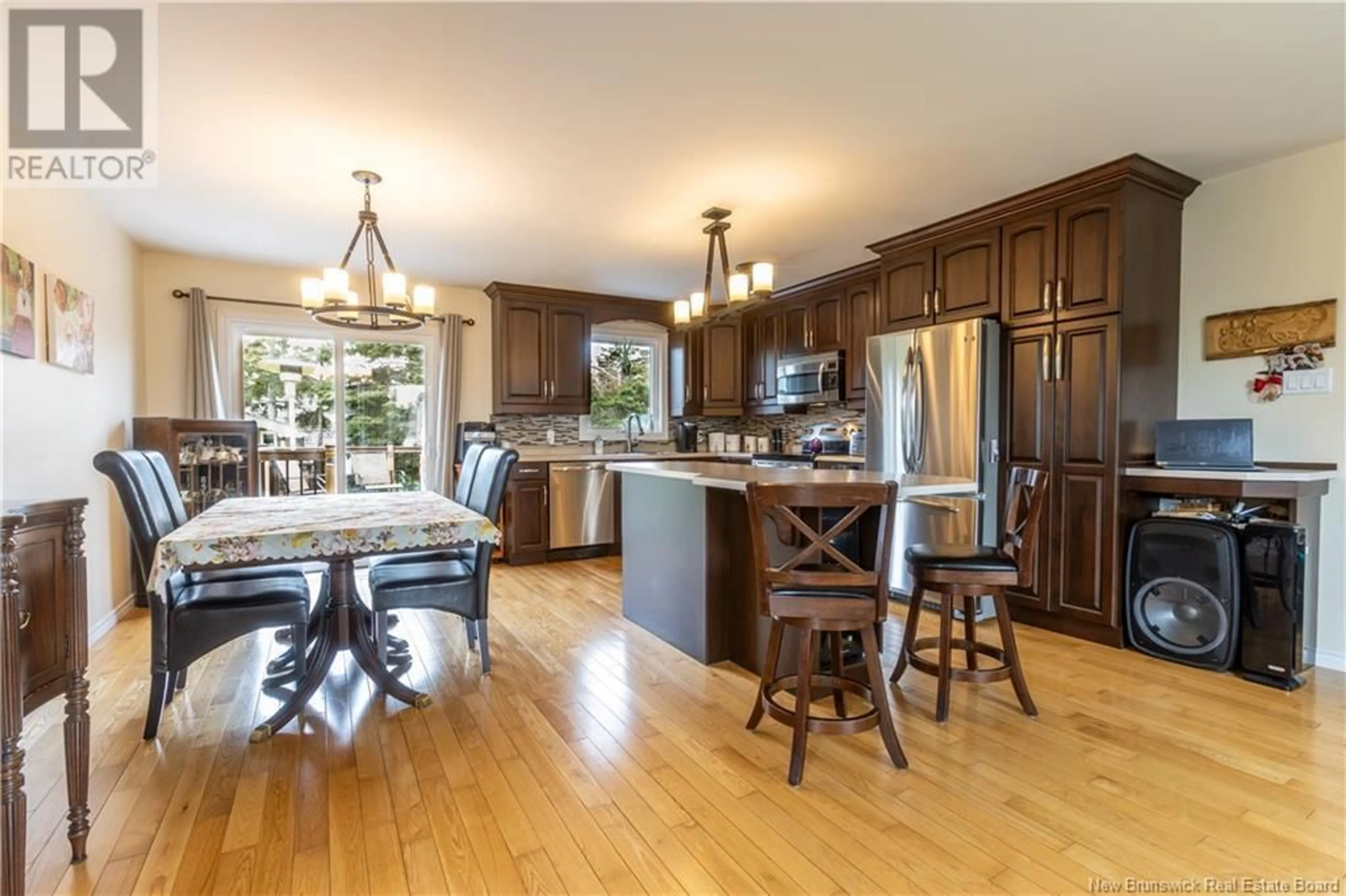 Open concept kitchen, wood/laminate floor for 32 MORNINGSIDE DRIVE, Moncton New Brunswick E1G1N8