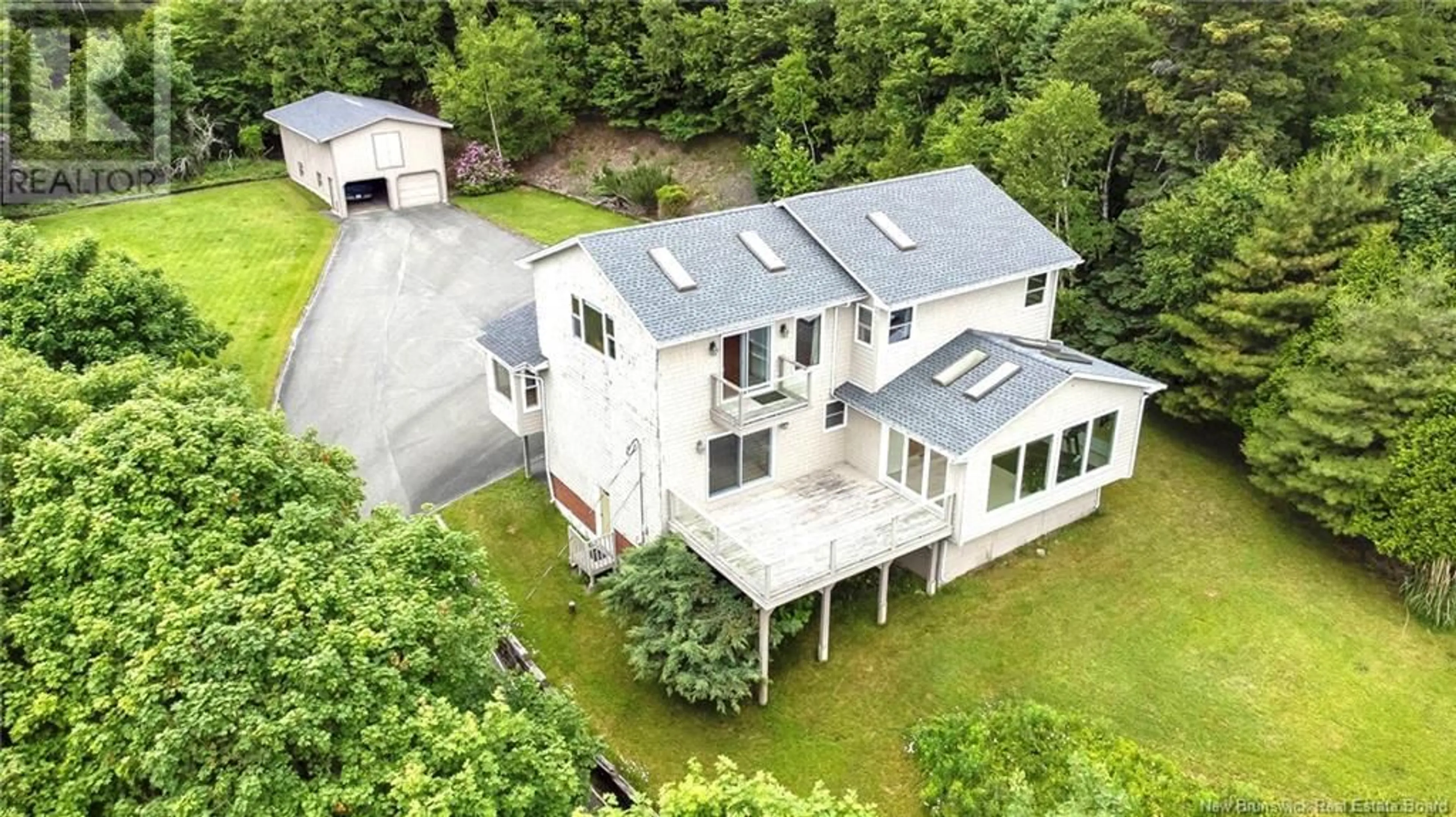 A pic from outside/outdoor area/front of a property/back of a property/a pic from drone, building for 315 PELTON ROAD, Saint John New Brunswick E2K5H6