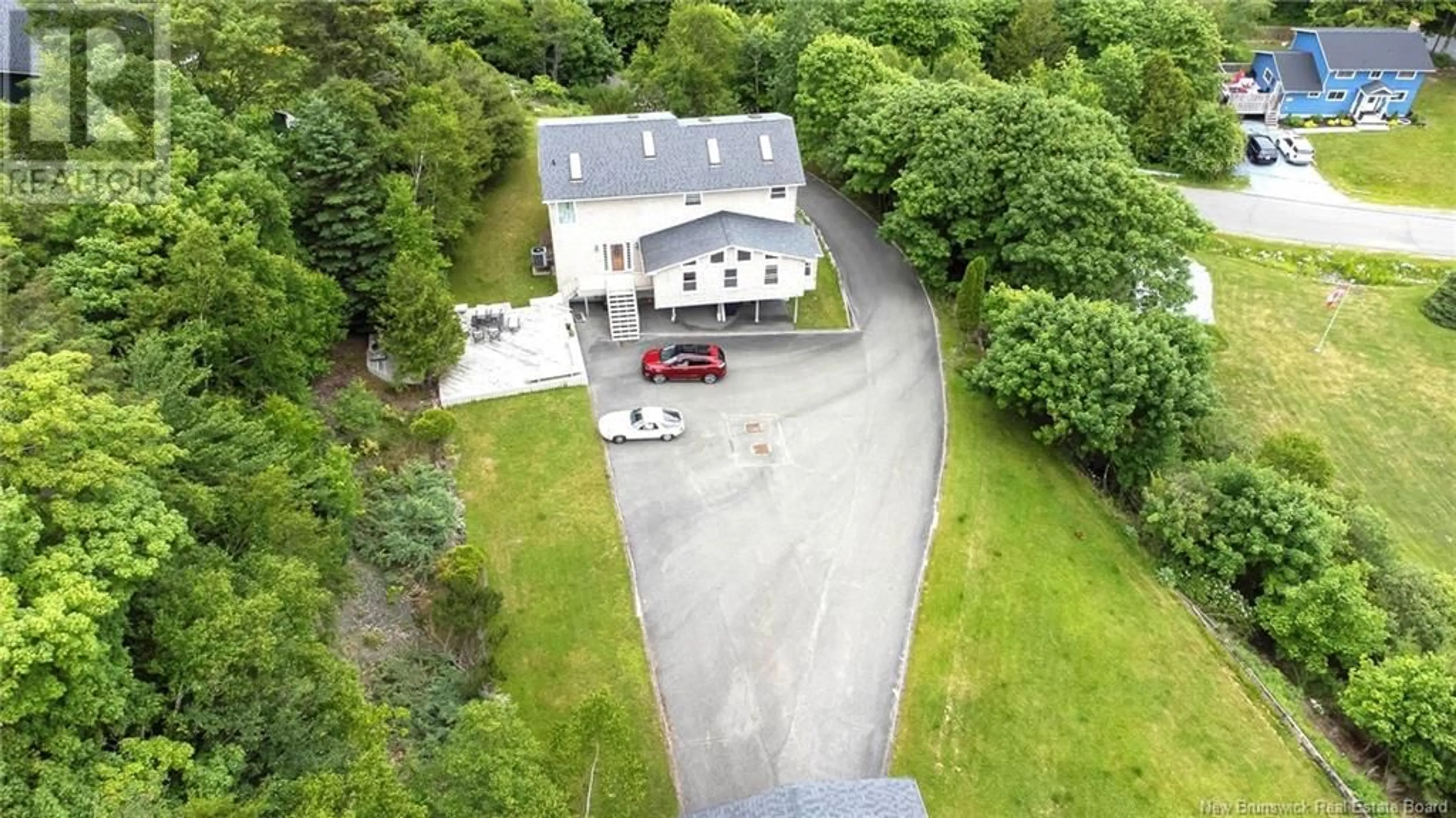 A pic from outside/outdoor area/front of a property/back of a property/a pic from drone, building for 315 PELTON ROAD, Saint John New Brunswick E2K5H6
