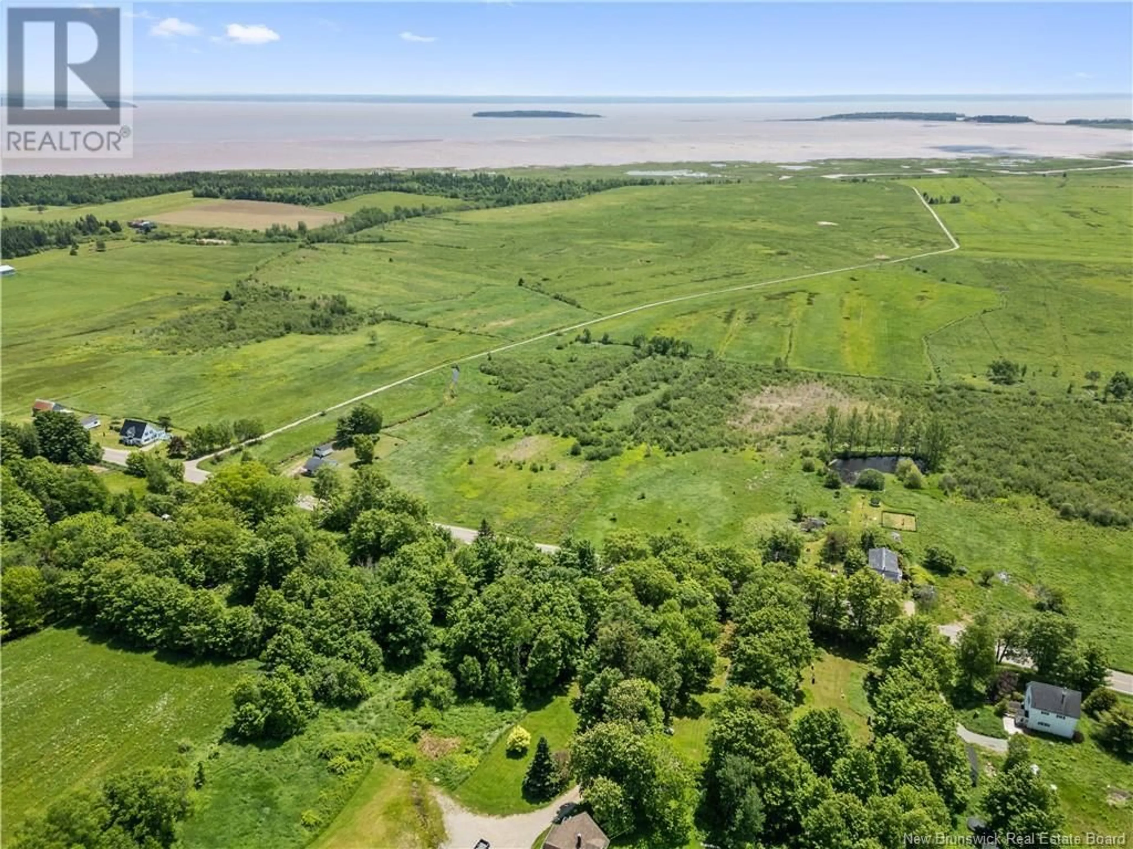 A pic from outside/outdoor area/front of a property/back of a property/a pic from drone, water/lake/river/ocean view for 5141 ROUTE 114, Shepody New Brunswick E4H4K6