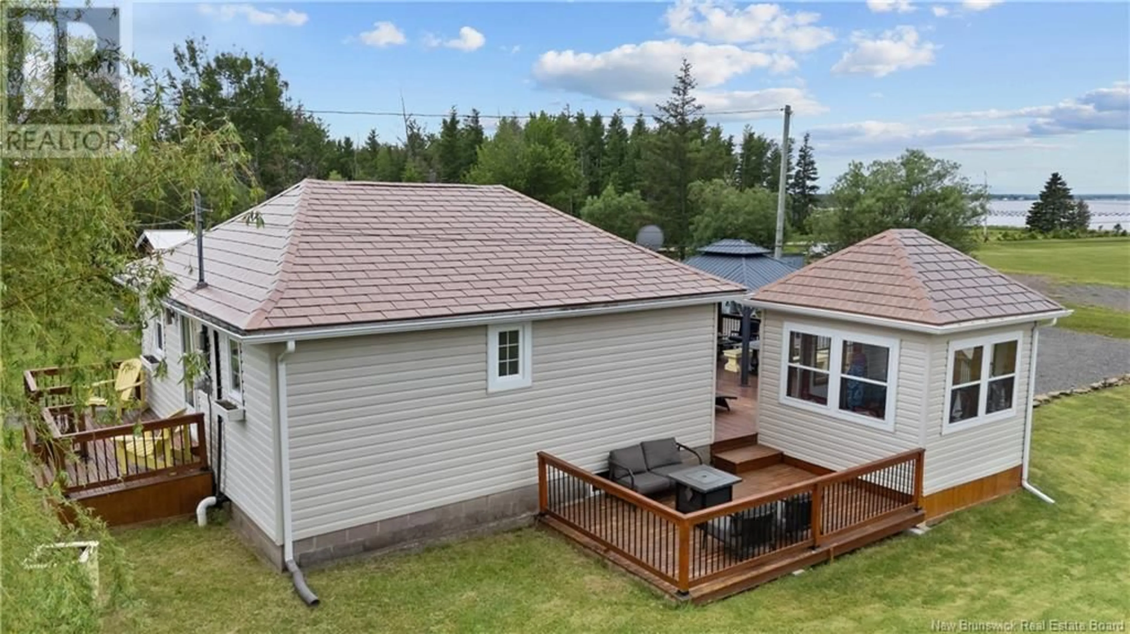 A pic from outside/outdoor area/front of a property/back of a property/a pic from drone, unknown for 32 ALLEE DES COPAINS, Grande-Digue New Brunswick E4R5N7