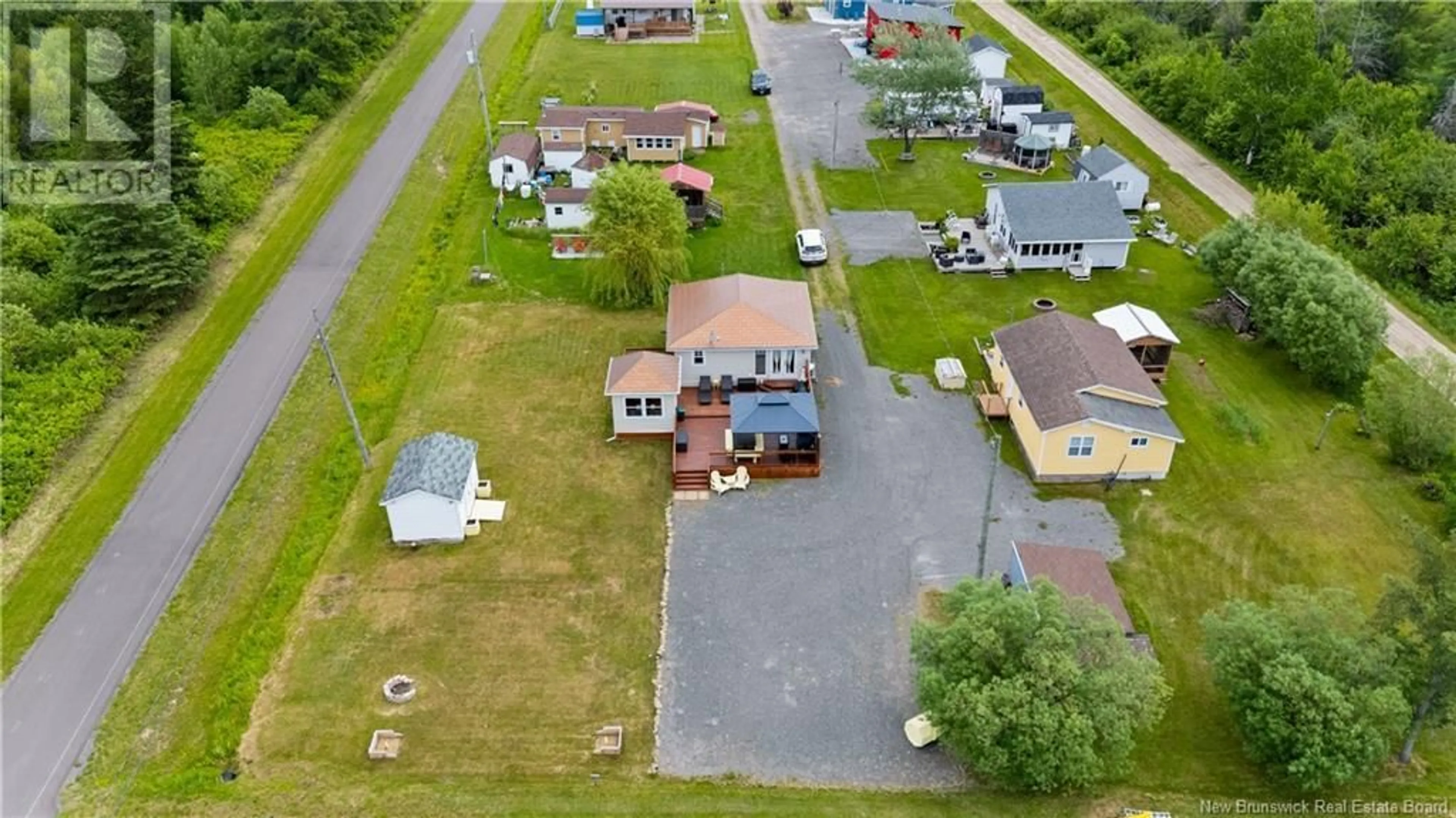 A pic from outside/outdoor area/front of a property/back of a property/a pic from drone, street for 32 ALLEE DES COPAINS, Grande-Digue New Brunswick E4R5N7