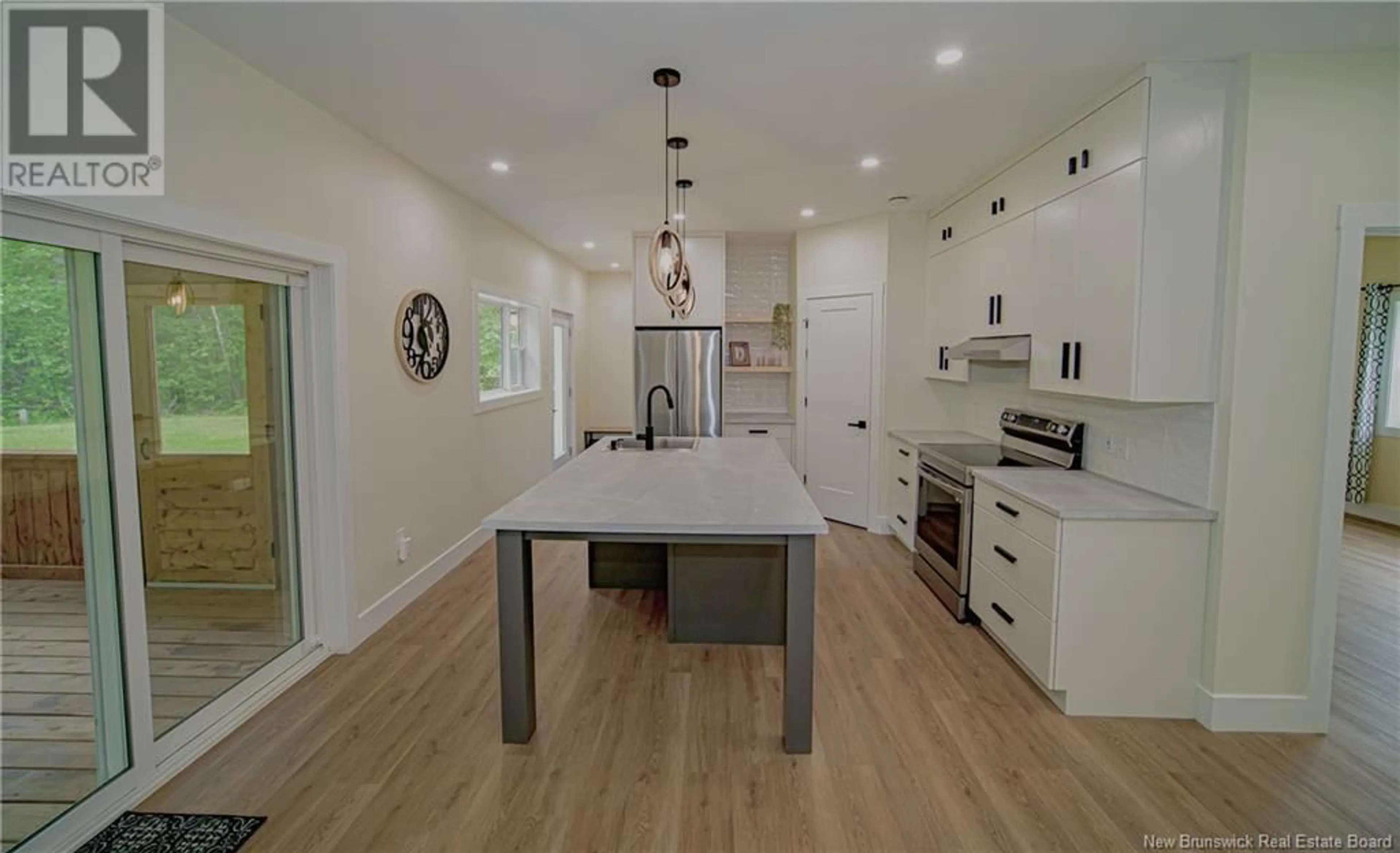 Open concept kitchen, wood/laminate floor for 30 MAPLE LEAF DRIVE, Lincoln New Brunswick E3B7G9