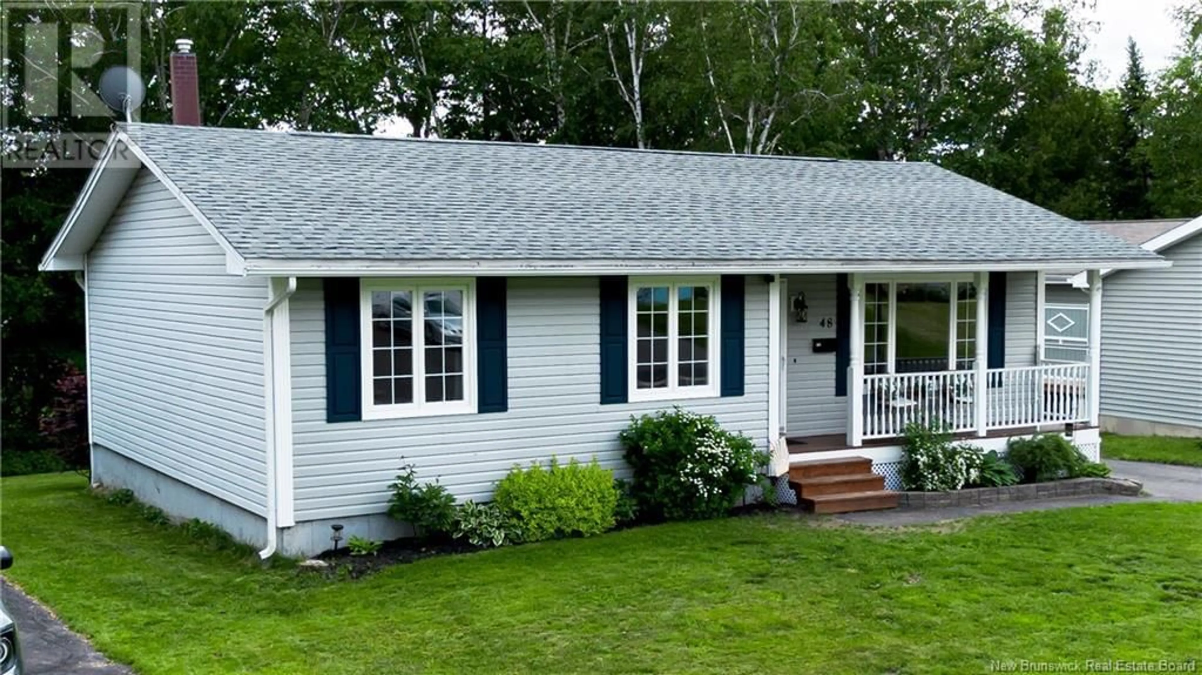 Home with vinyl exterior material, street for 48 BARKER STREET, Oromocto New Brunswick E2V2K9