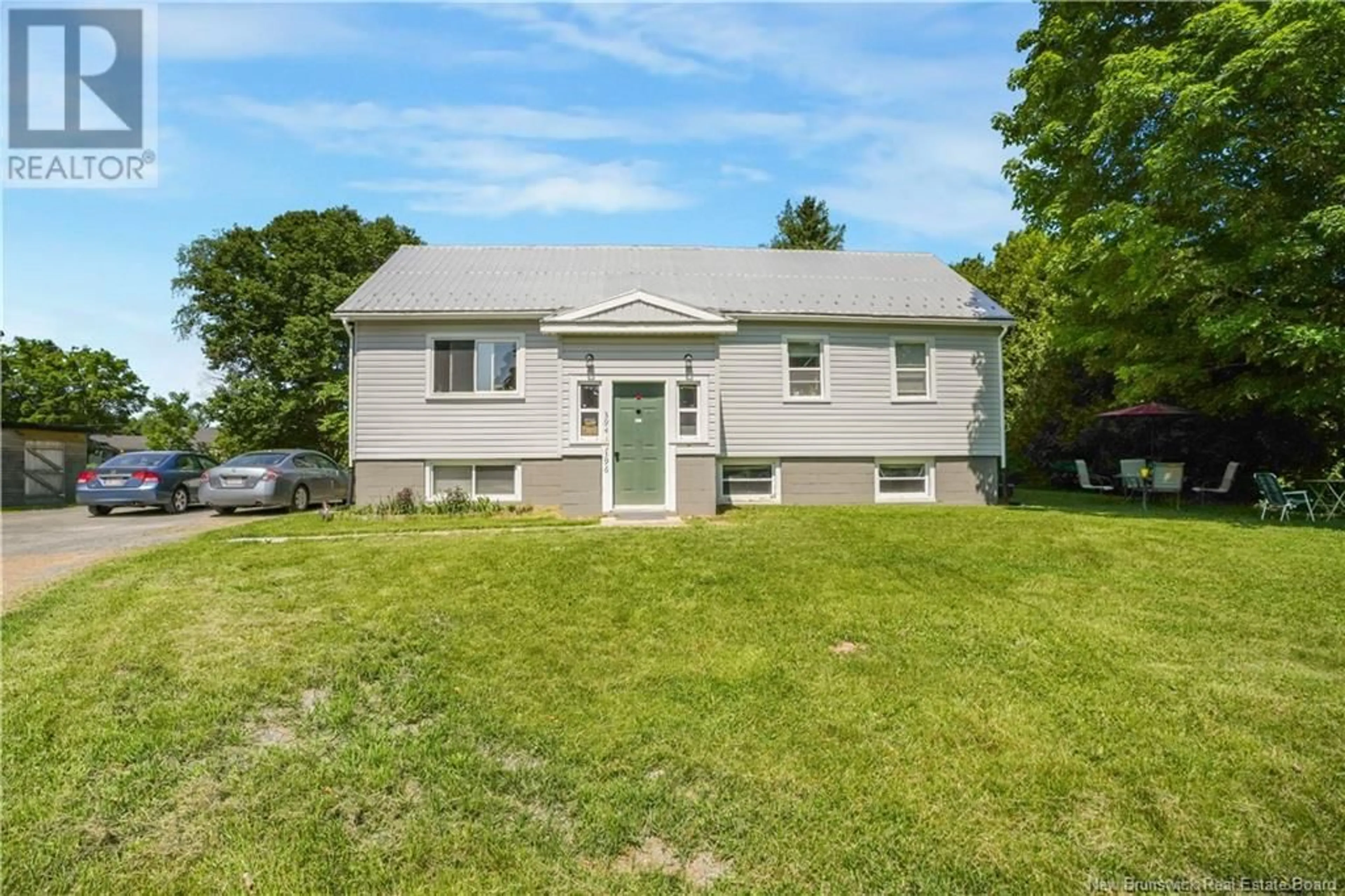 A pic from outside/outdoor area/front of a property/back of a property/a pic from drone, street for 394-396 NEW MARYLAND HWY, New Maryland New Brunswick E3C1E5