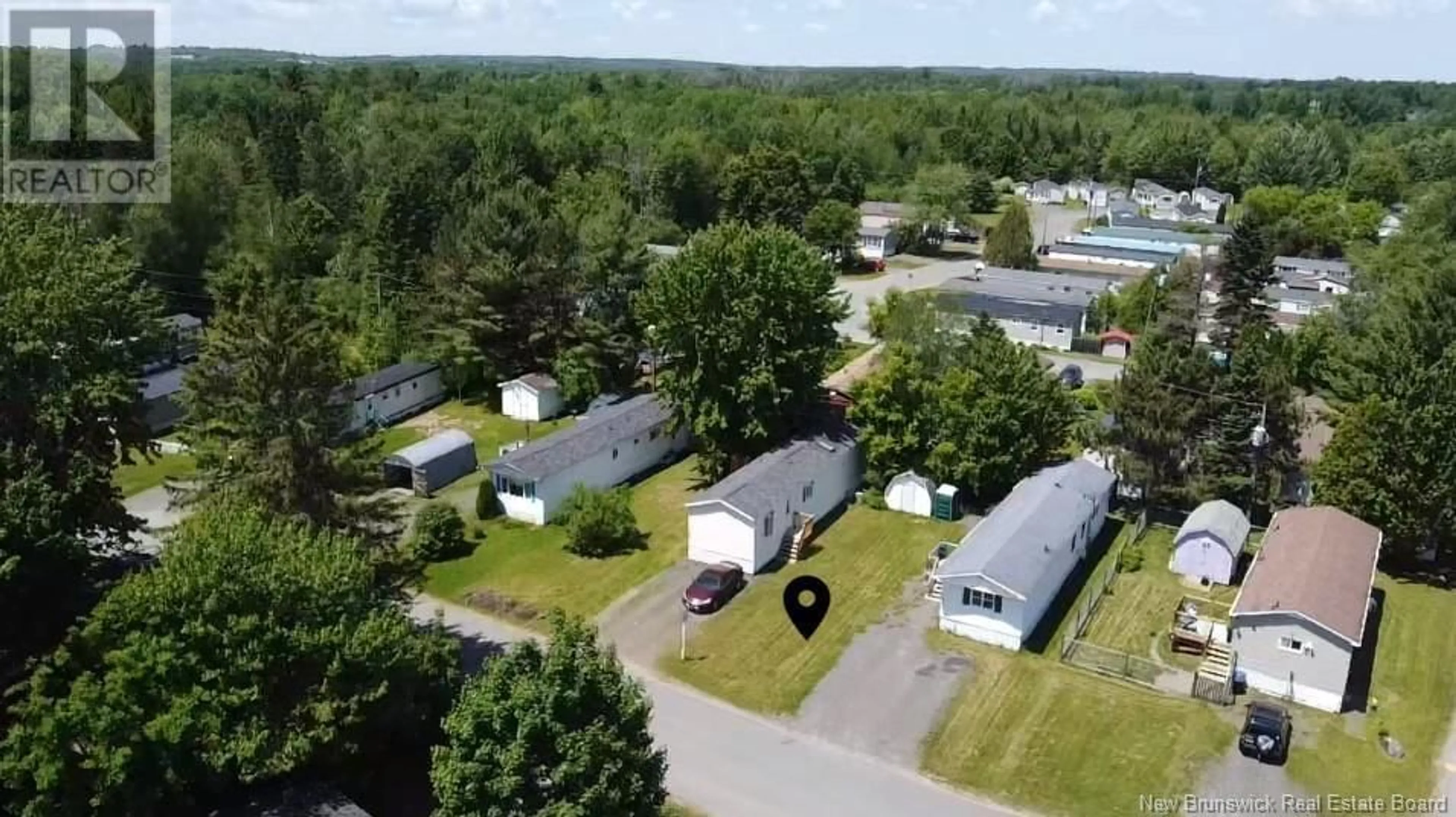 A pic from outside/outdoor area/front of a property/back of a property/a pic from drone, street for 193 MCGEE STREET, Fredericton New Brunswick E3B8M1