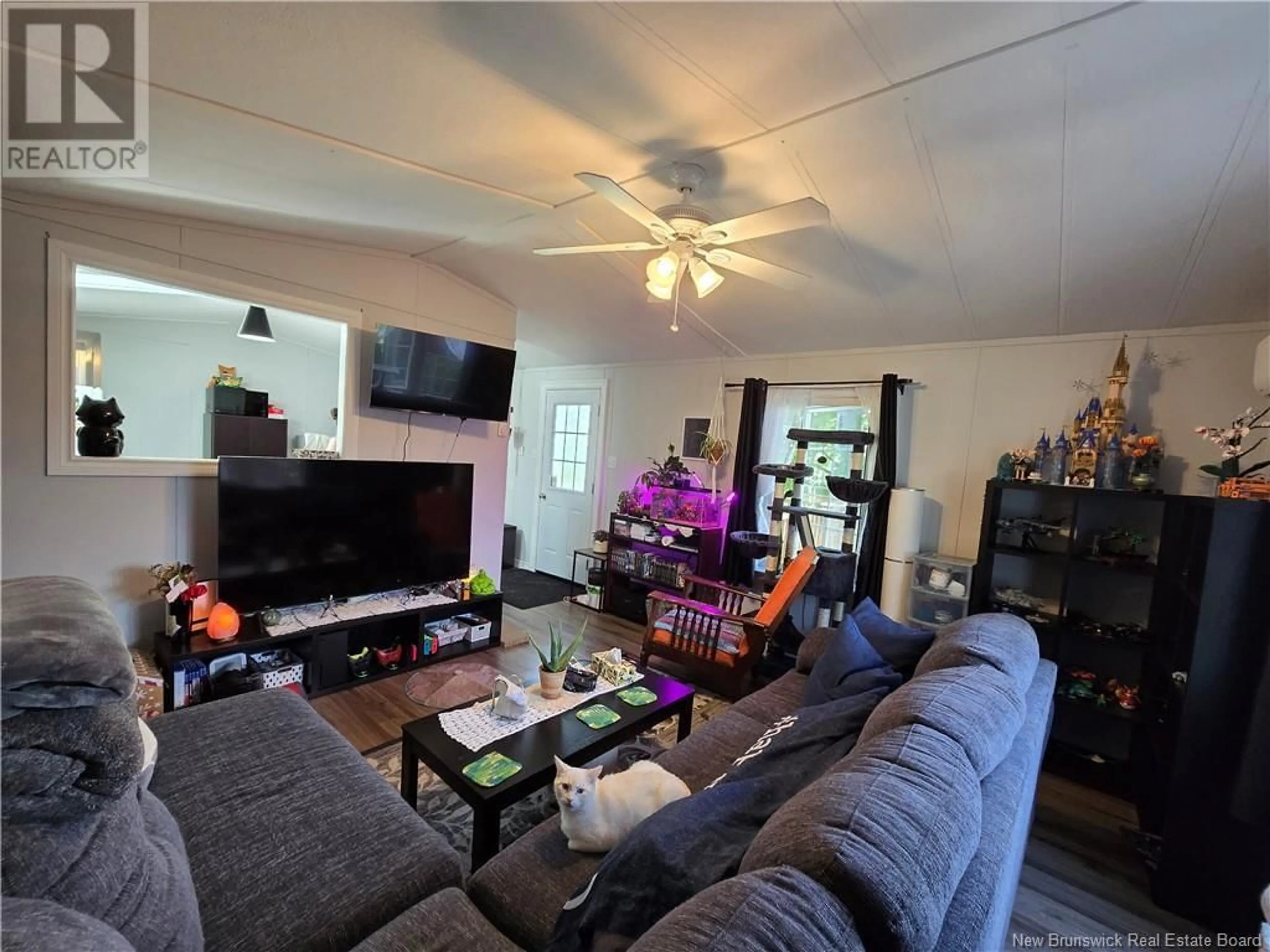 Living room with furniture, wood/laminate floor for 193 MCGEE STREET, Fredericton New Brunswick E3B8M1