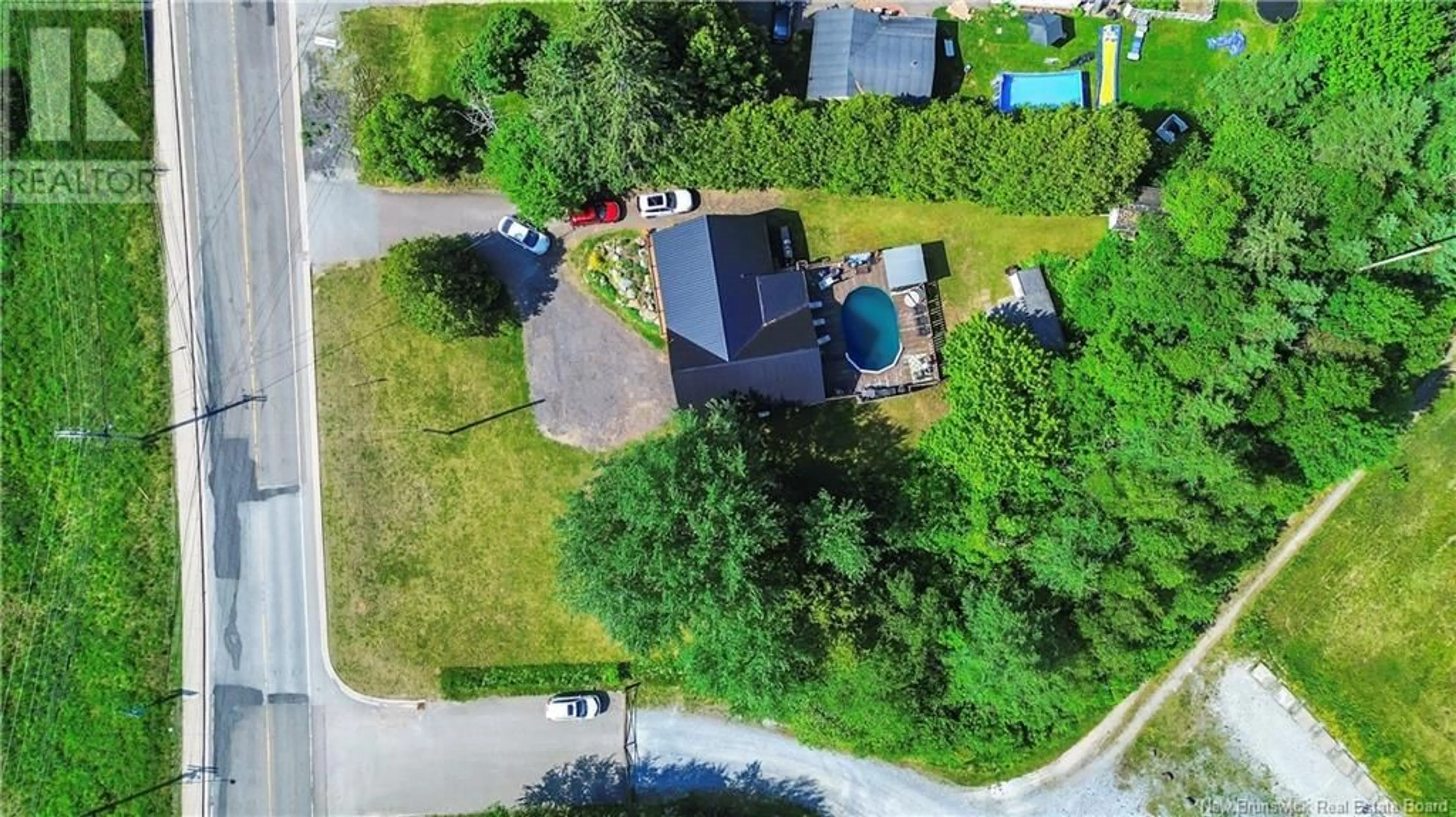 A pic from outside/outdoor area/front of a property/back of a property/a pic from drone, unknown for 497 HAMPTON ROAD, Quispamsis New Brunswick E2E3W8