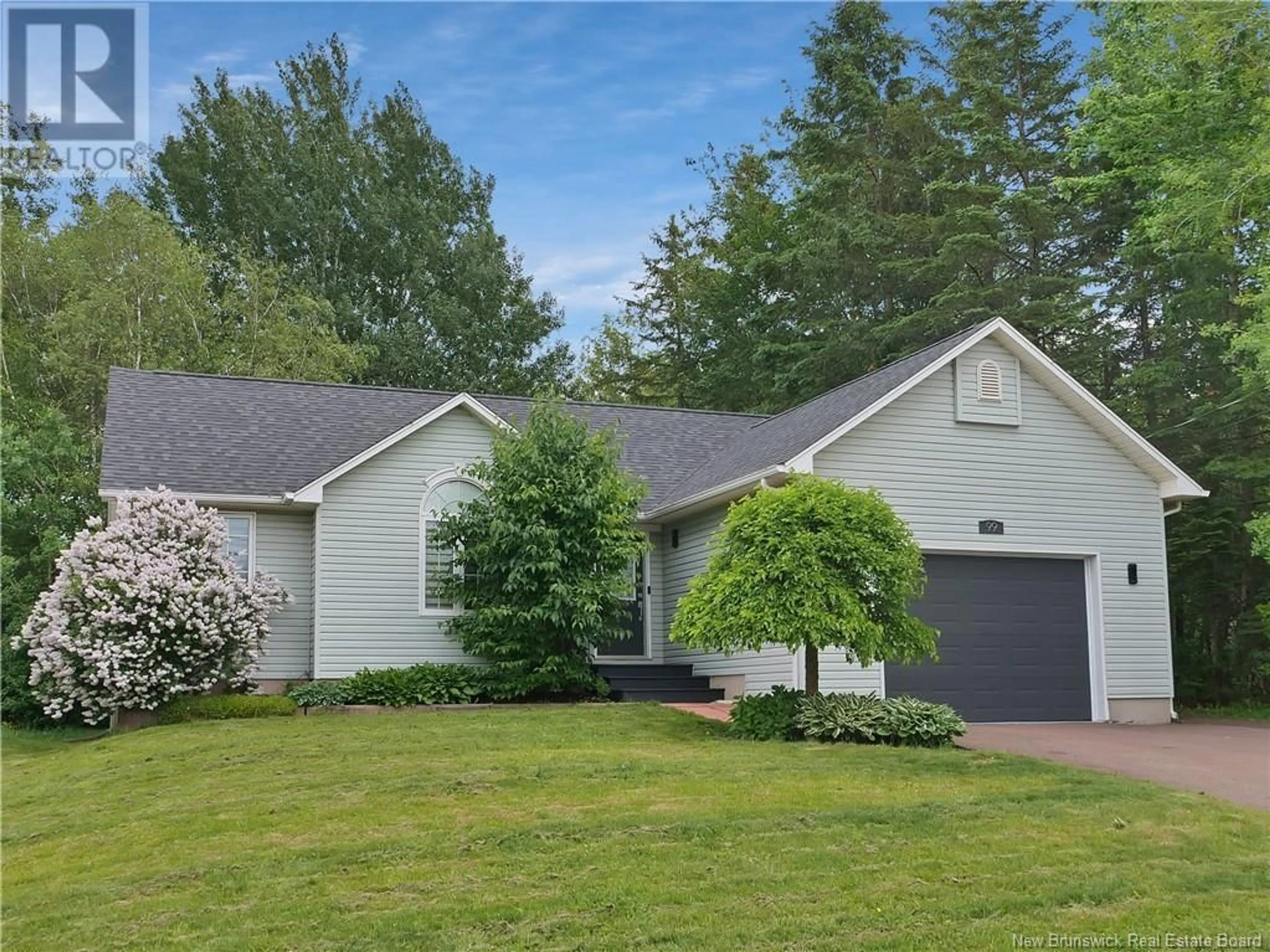 Home with vinyl exterior material, street for 99 THOMAS, Dieppe New Brunswick E1A5W2