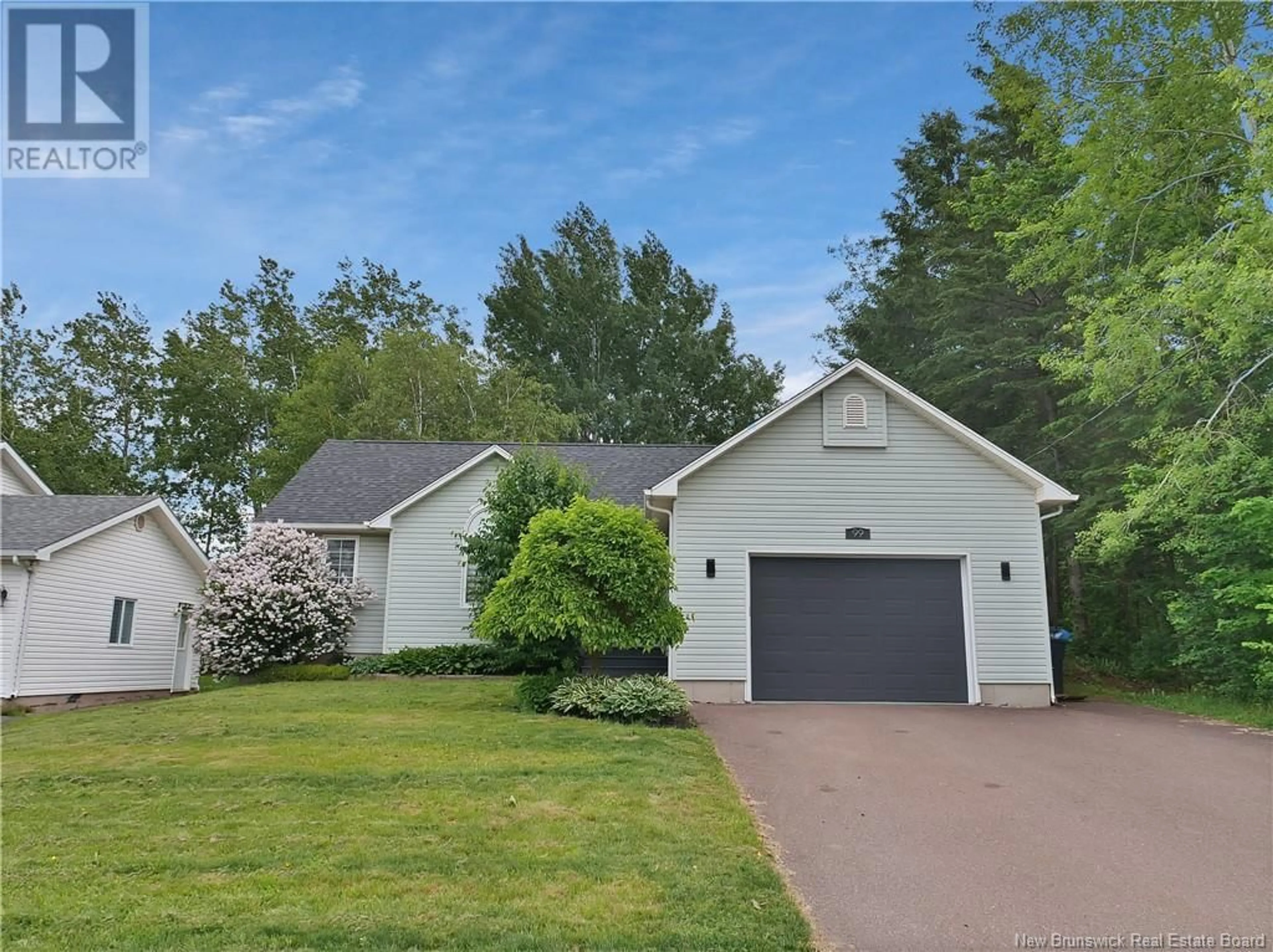 Home with vinyl exterior material, street for 99 THOMAS, Dieppe New Brunswick E1A5W2