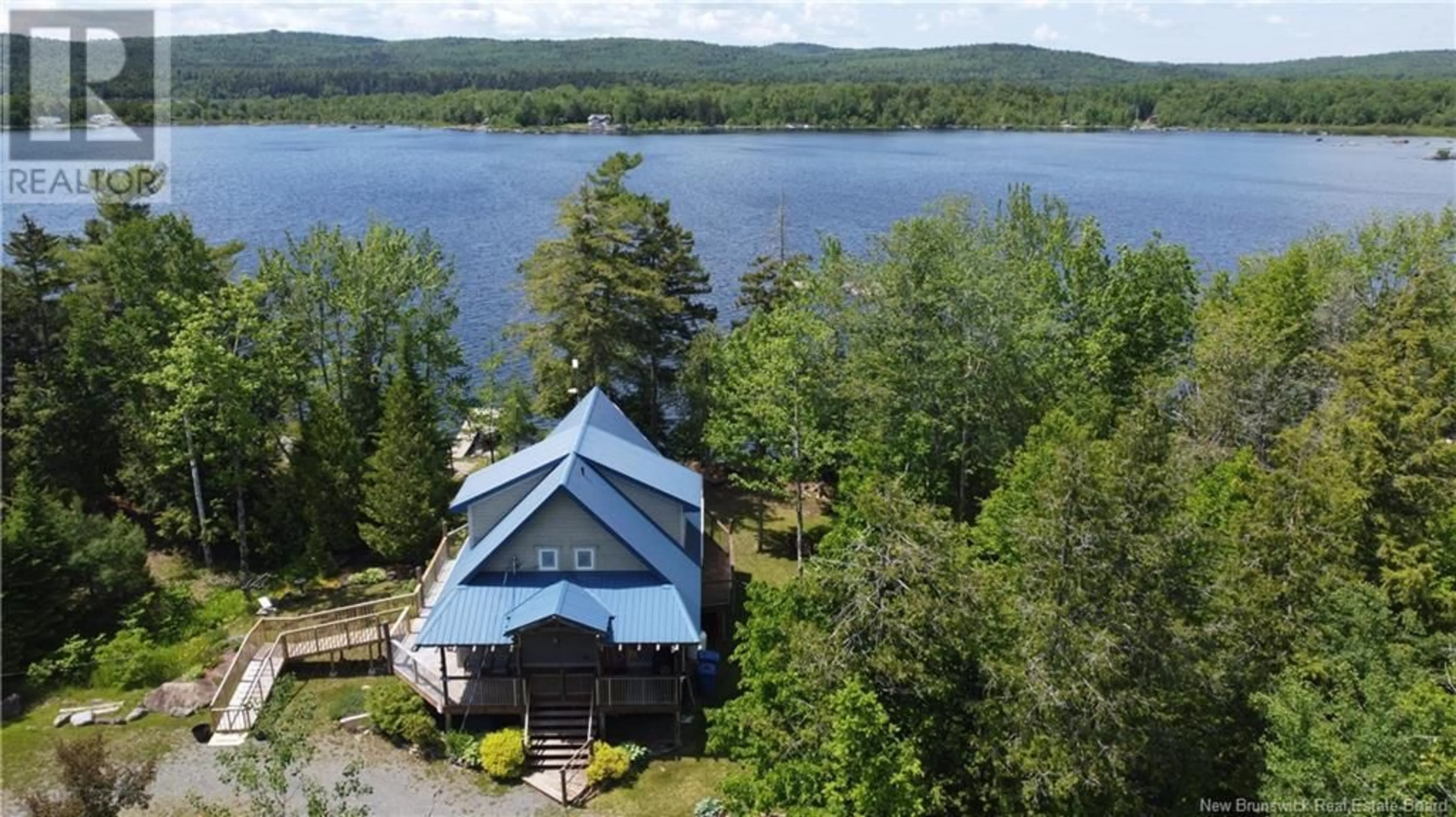 A pic from outside/outdoor area/front of a property/back of a property/a pic from drone, water/lake/river/ocean view for 19 DELONG LANE, Eel River Lake New Brunswick E6H0B5