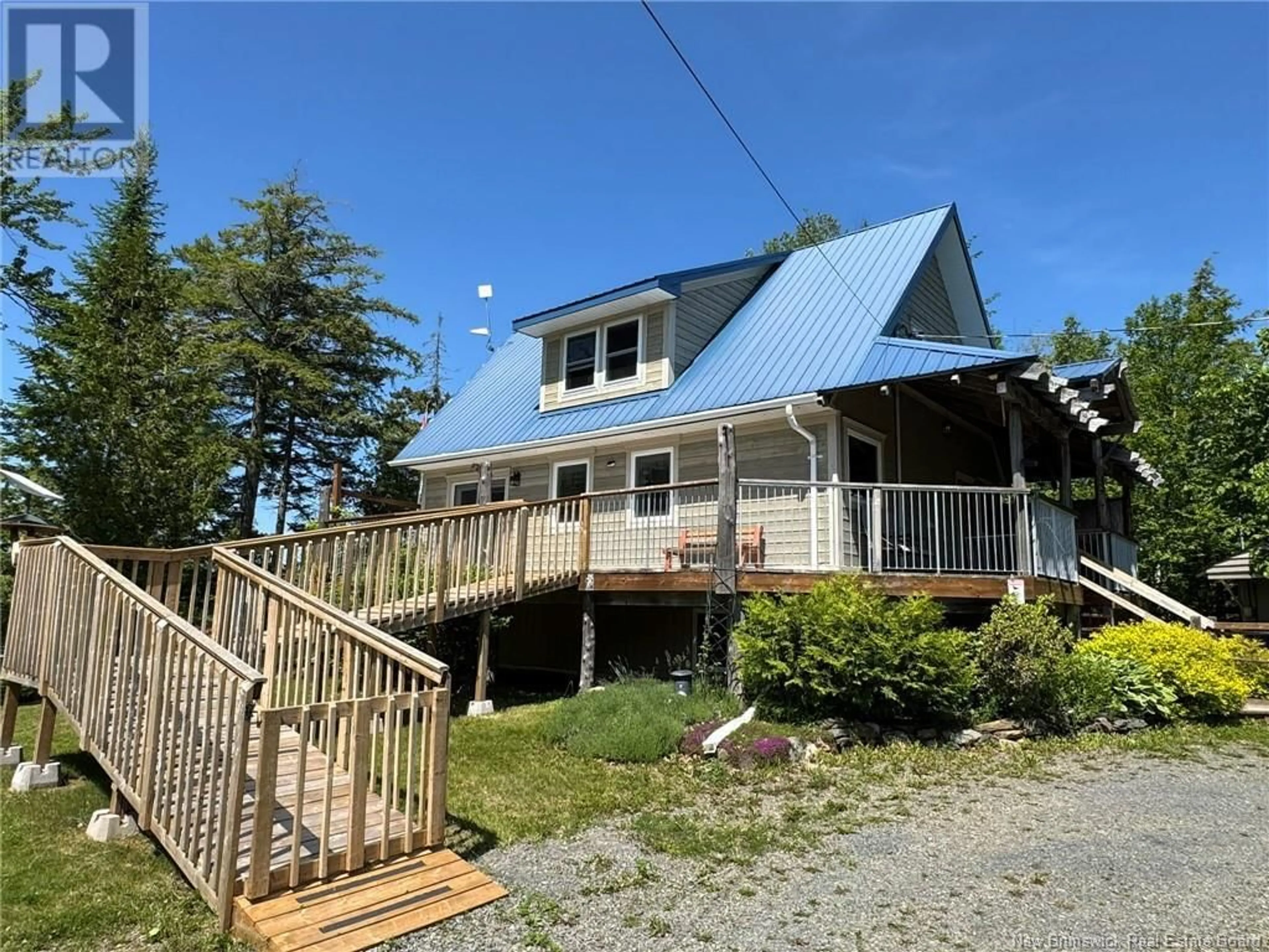 A pic from outside/outdoor area/front of a property/back of a property/a pic from drone, water/lake/river/ocean view for 19 DELONG LANE, Eel River Lake New Brunswick E6H0B5