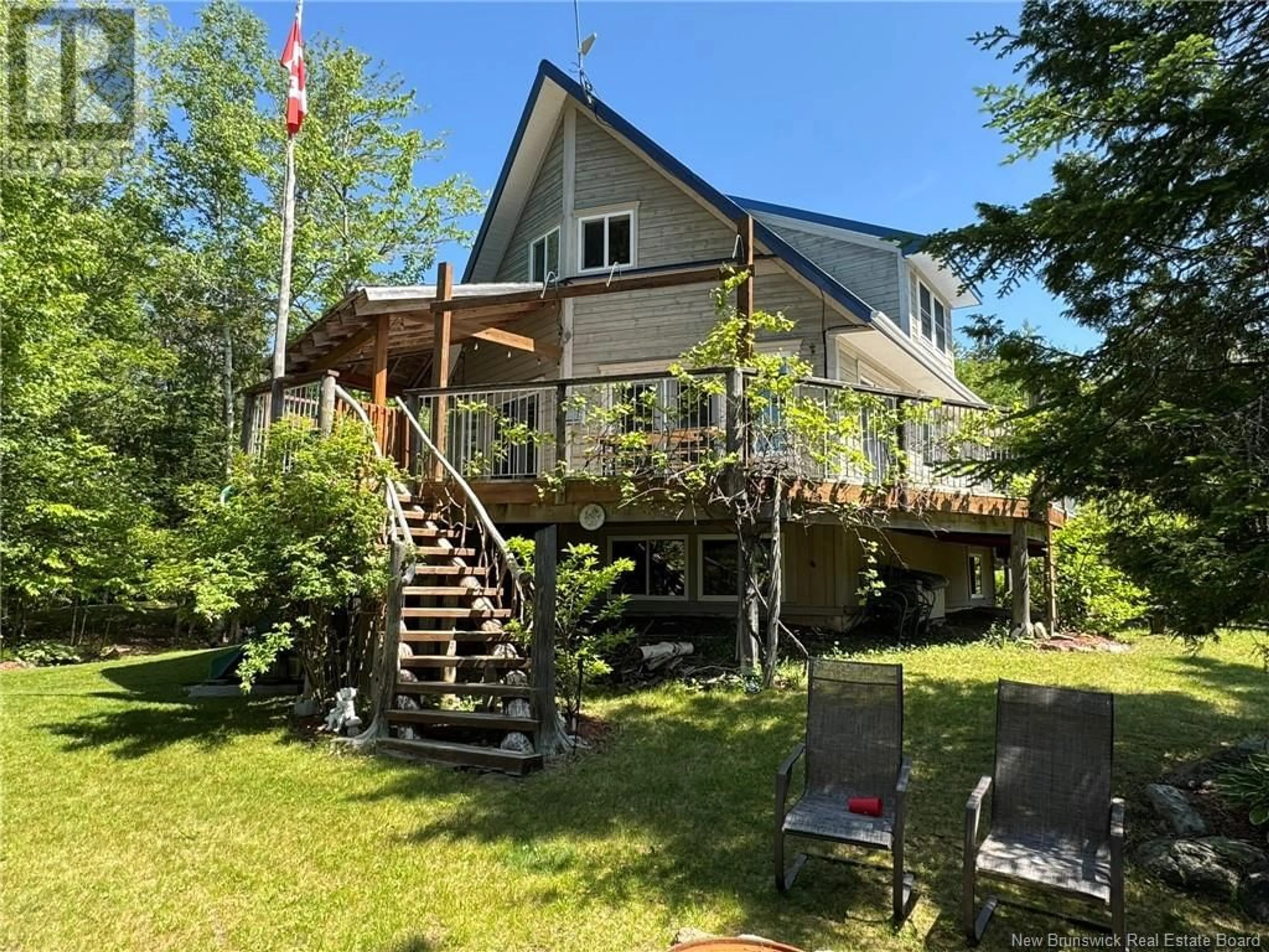 A pic from outside/outdoor area/front of a property/back of a property/a pic from drone, water/lake/river/ocean view for 19 DELONG LANE, Eel River Lake New Brunswick E6H0B5