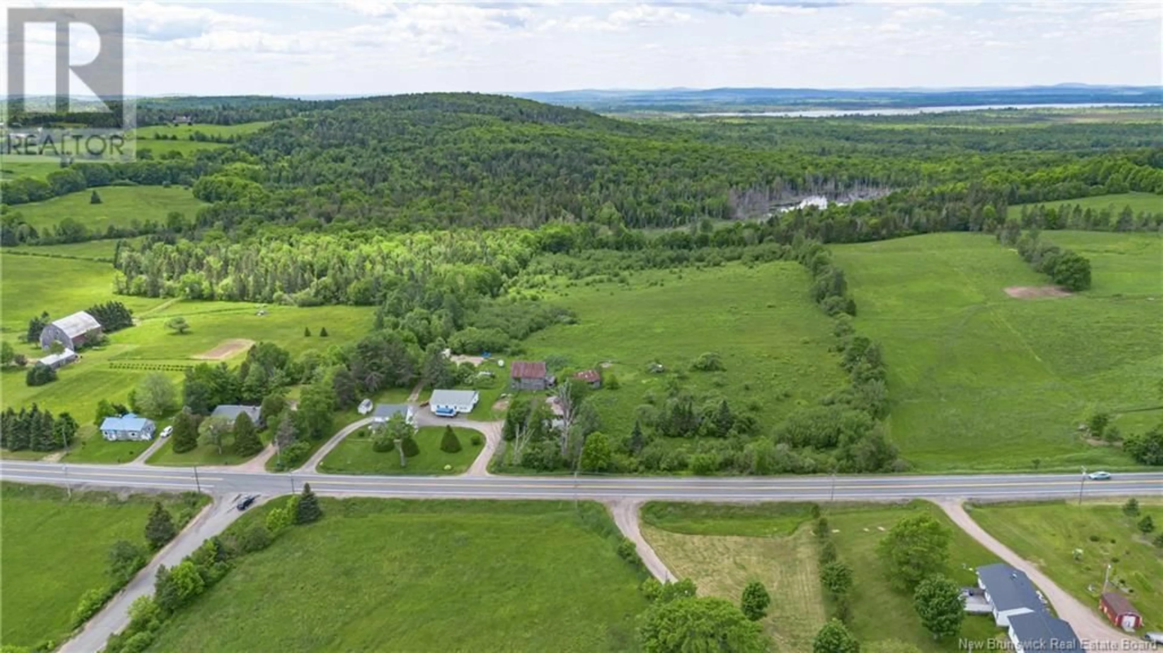 A pic from outside/outdoor area/front of a property/back of a property/a pic from drone, water/lake/river/ocean view for 2098 ROUTE 3, Harvey New Brunswick E6K1L4