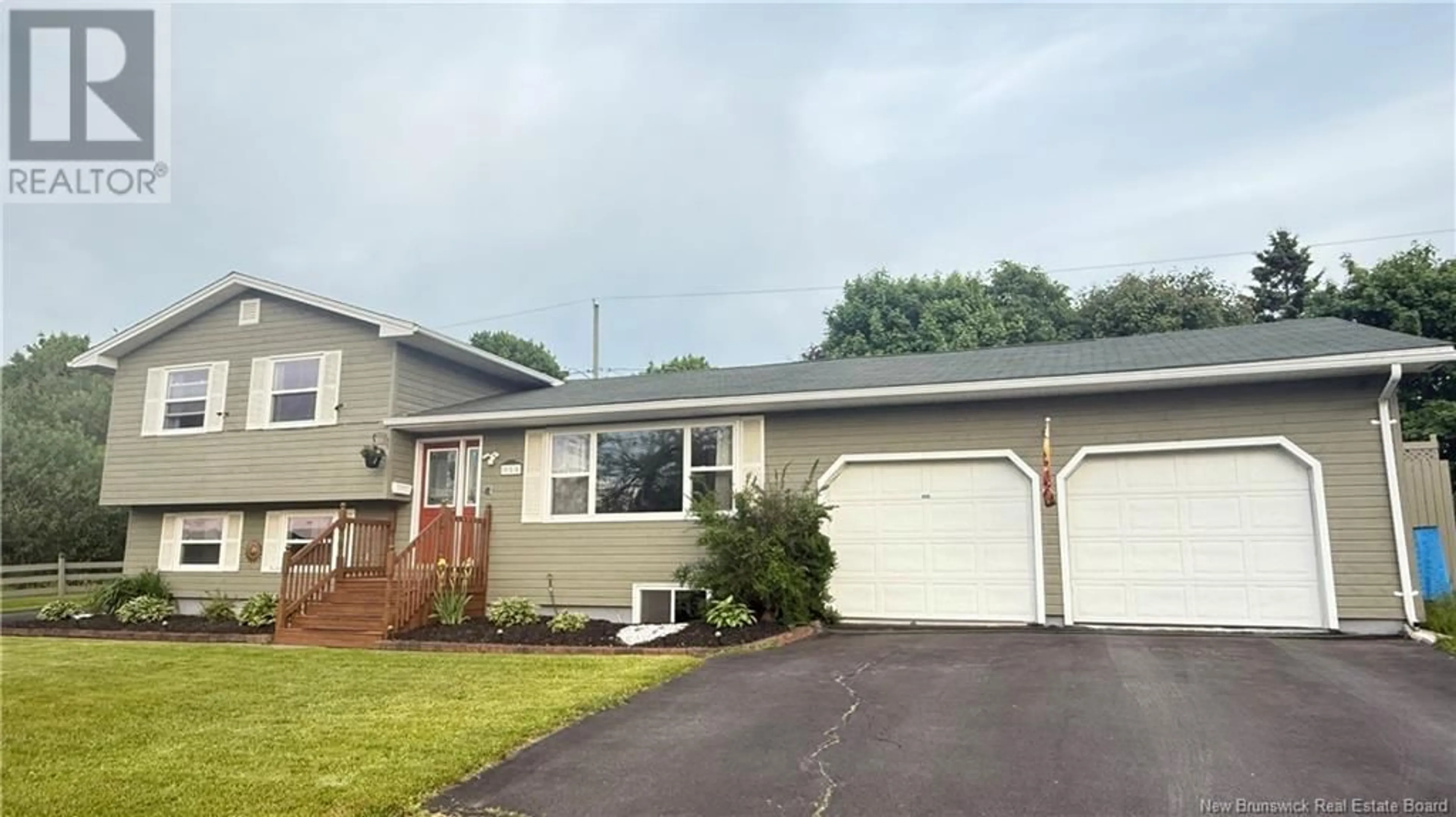 Home with vinyl exterior material, street for 950 MOLLINS DRIVE, Saint John New Brunswick E2M4L8