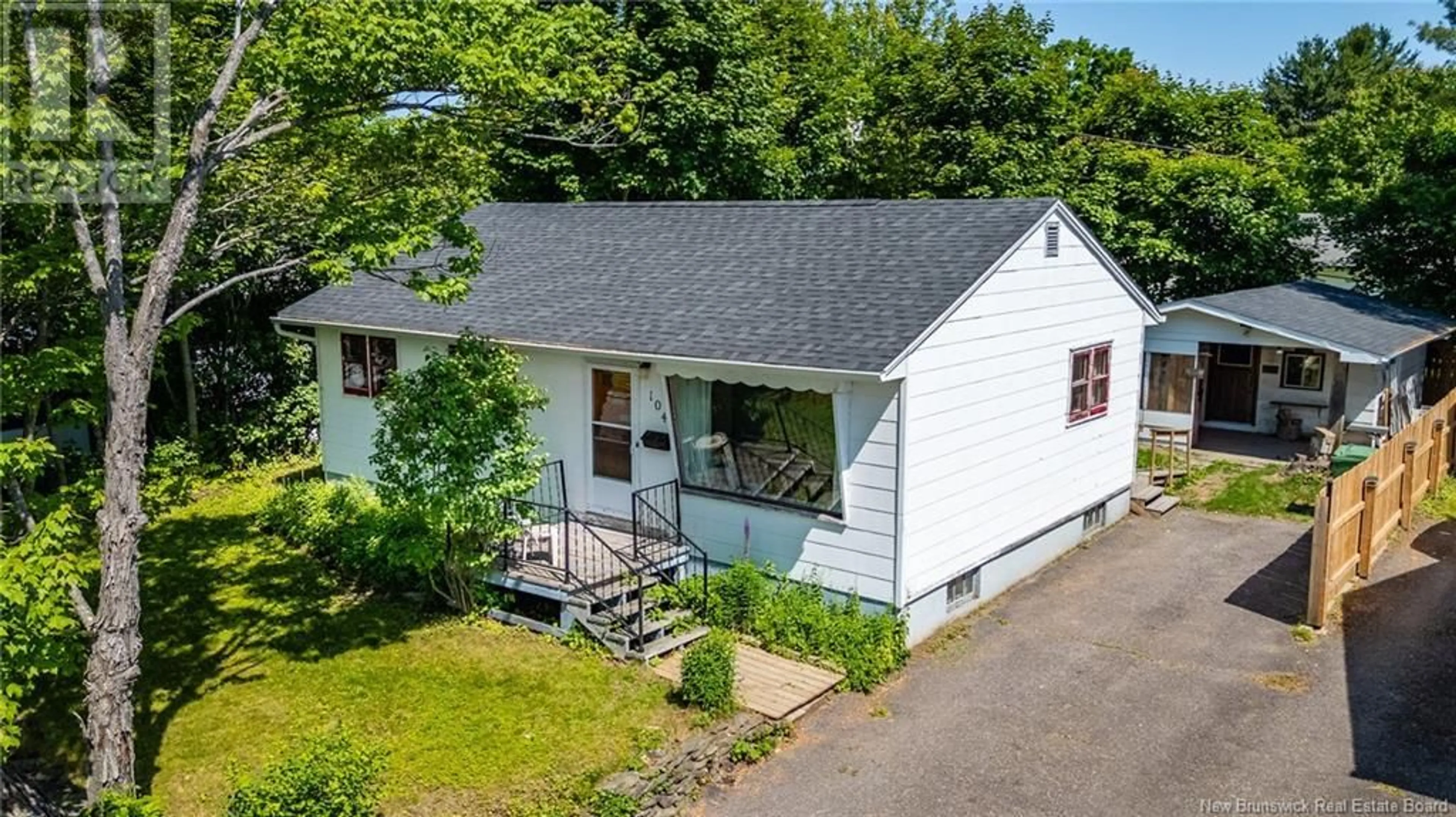 A pic from outside/outdoor area/front of a property/back of a property/a pic from drone, street for 104 MACFARLANE STREET, Fredericton New Brunswick E3A1V4