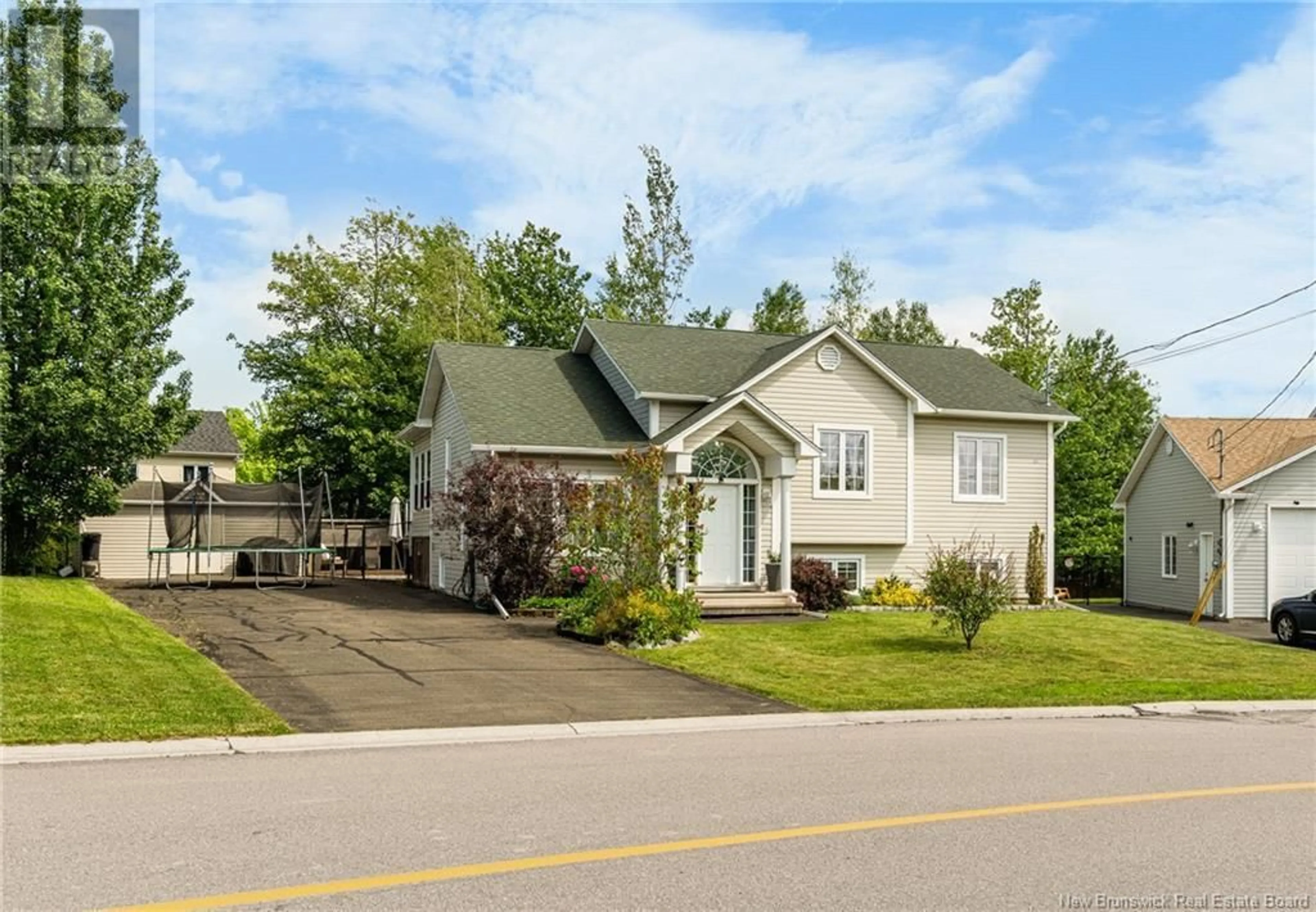 Home with vinyl exterior material, street for 141 THERIAULT, Dieppe New Brunswick E1A8B1
