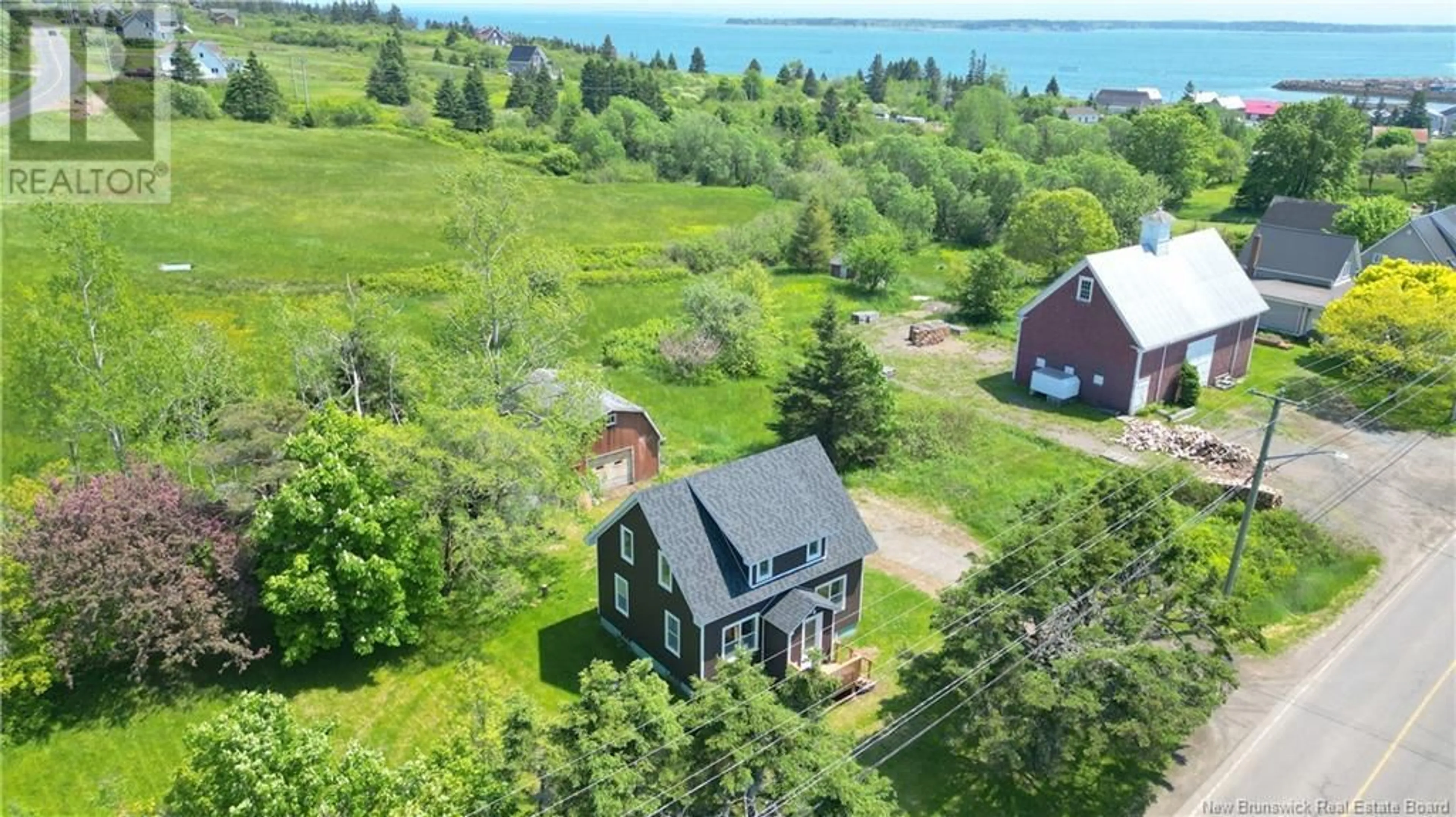 A pic from outside/outdoor area/front of a property/back of a property/a pic from drone, water/lake/river/ocean view for 1833 ROUTE 776, Grand Manan New Brunswick E5G2H9