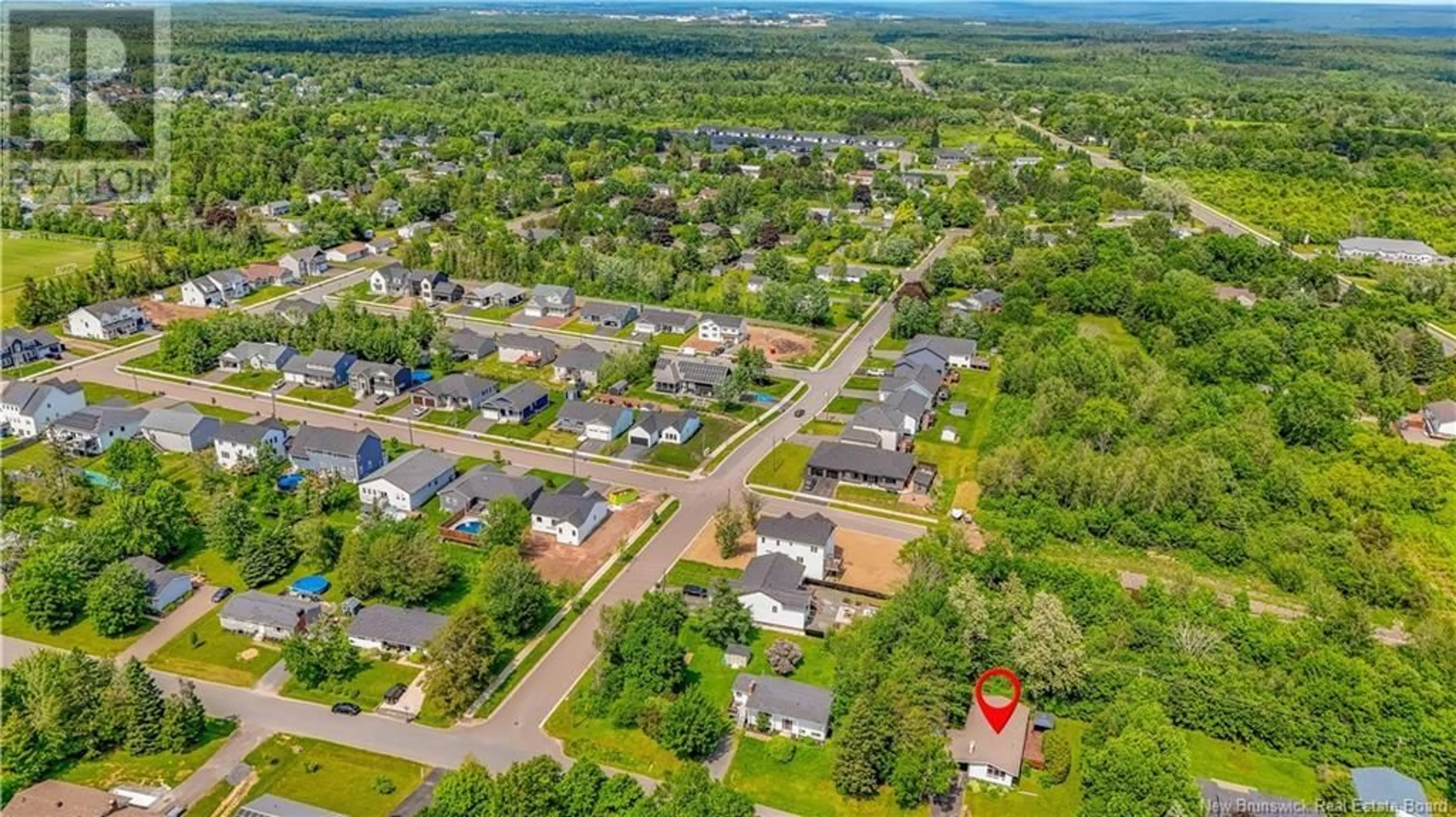 A pic from outside/outdoor area/front of a property/back of a property/a pic from drone, street for 111 PHILLIPS DRIVE, New Maryland New Brunswick E3C2E3